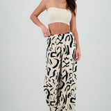 Pantalon fluido detalle estampado