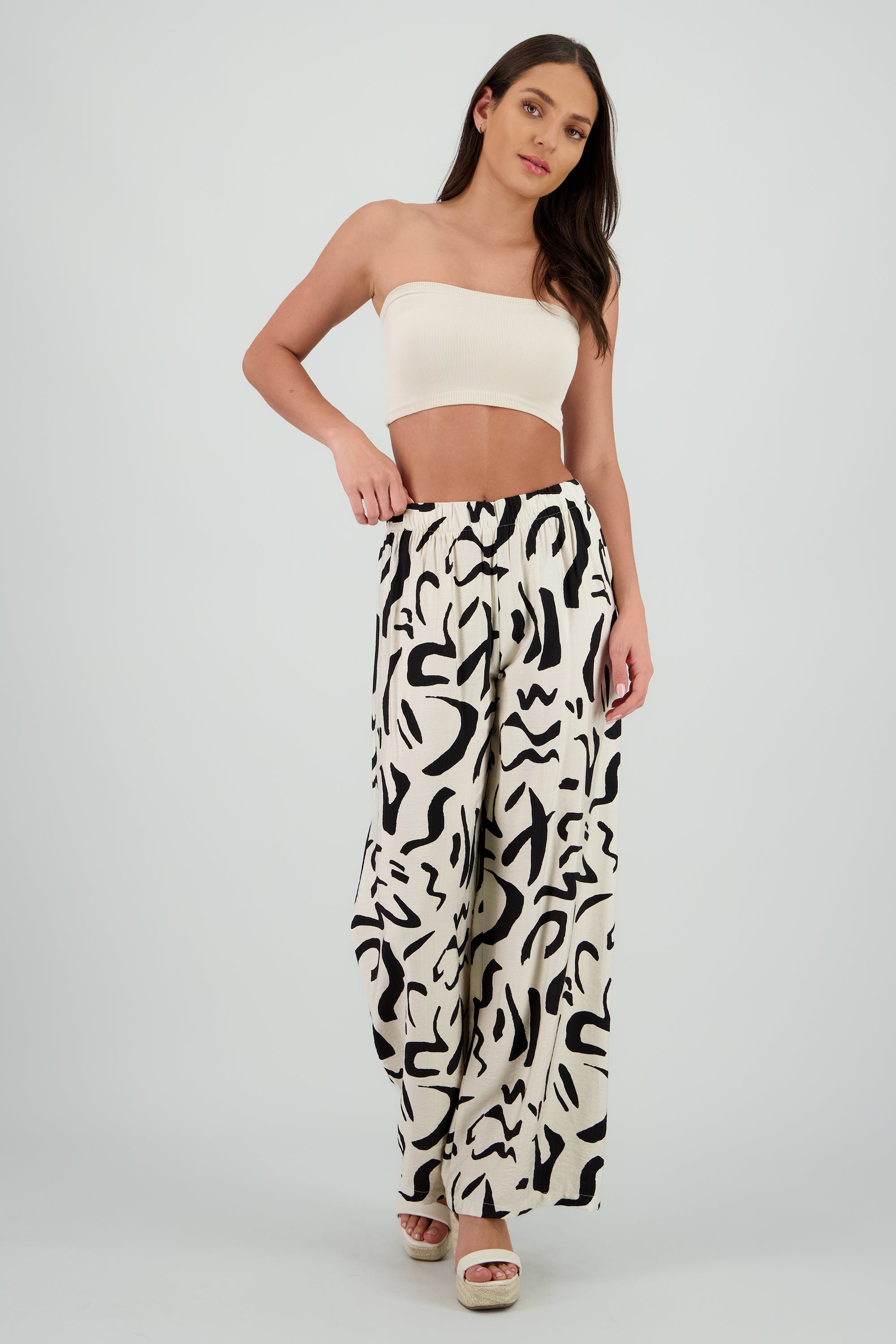 Pantalon fluido detalle estampado