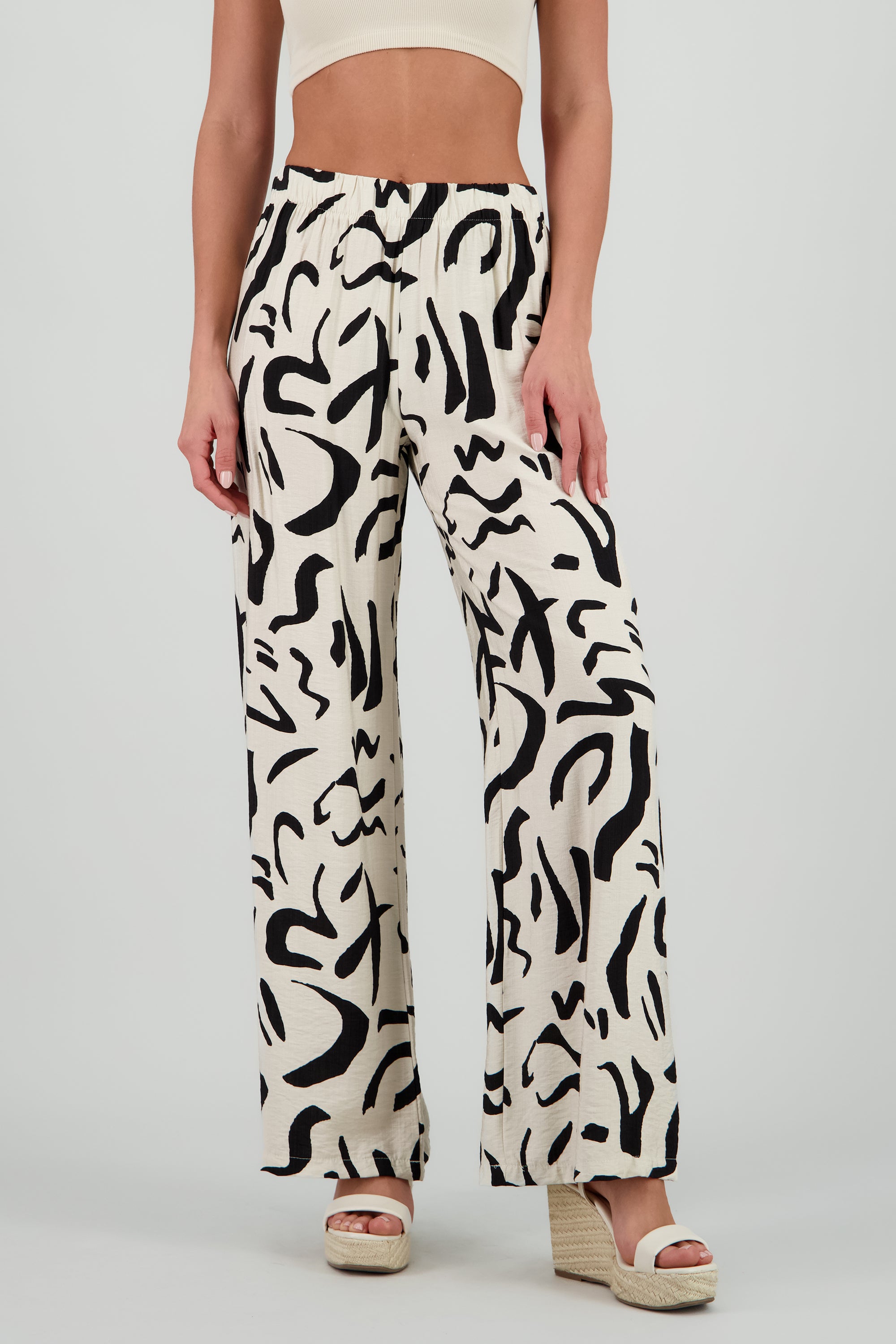 Pantalon fluido detalle estampado