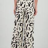 Pantalon fluido detalle estampado