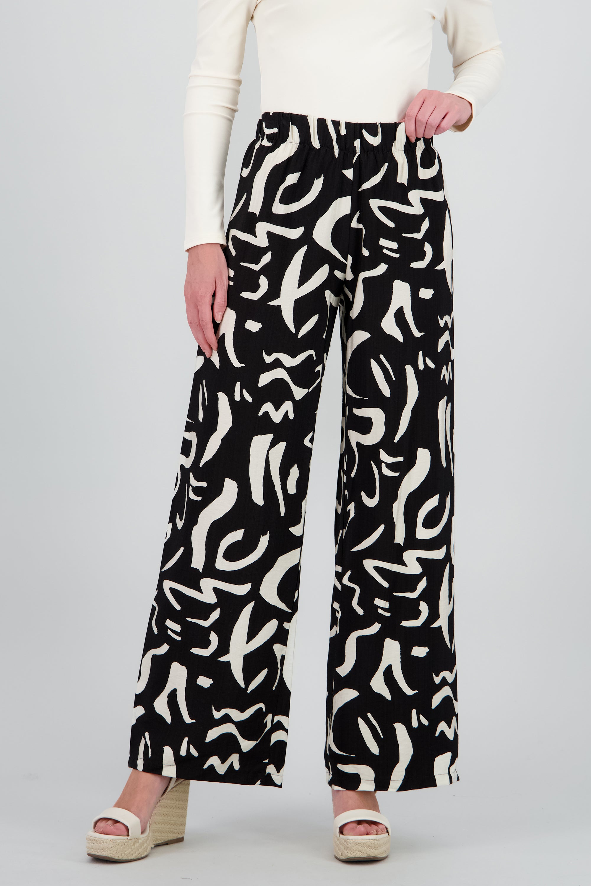 Pantalon fluido detalle estampado