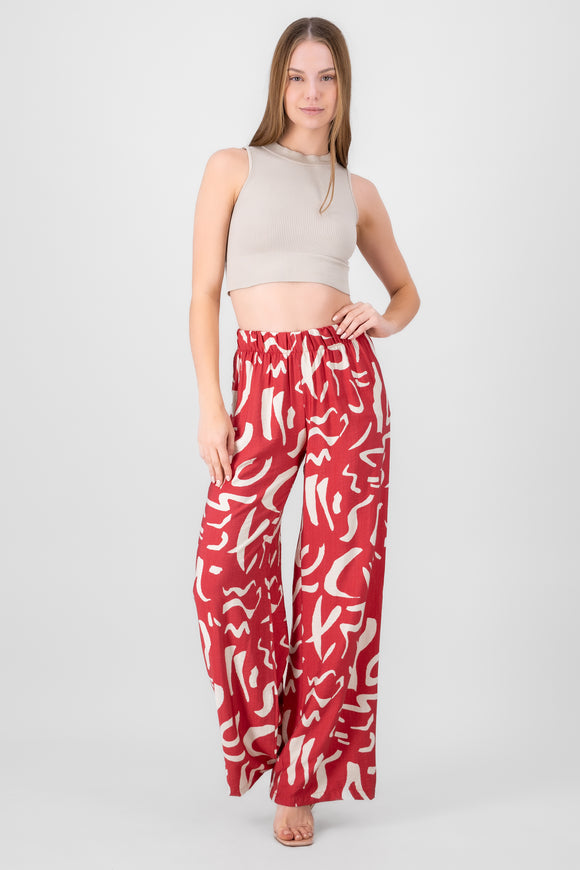 Pantalon fluido detalle estampado