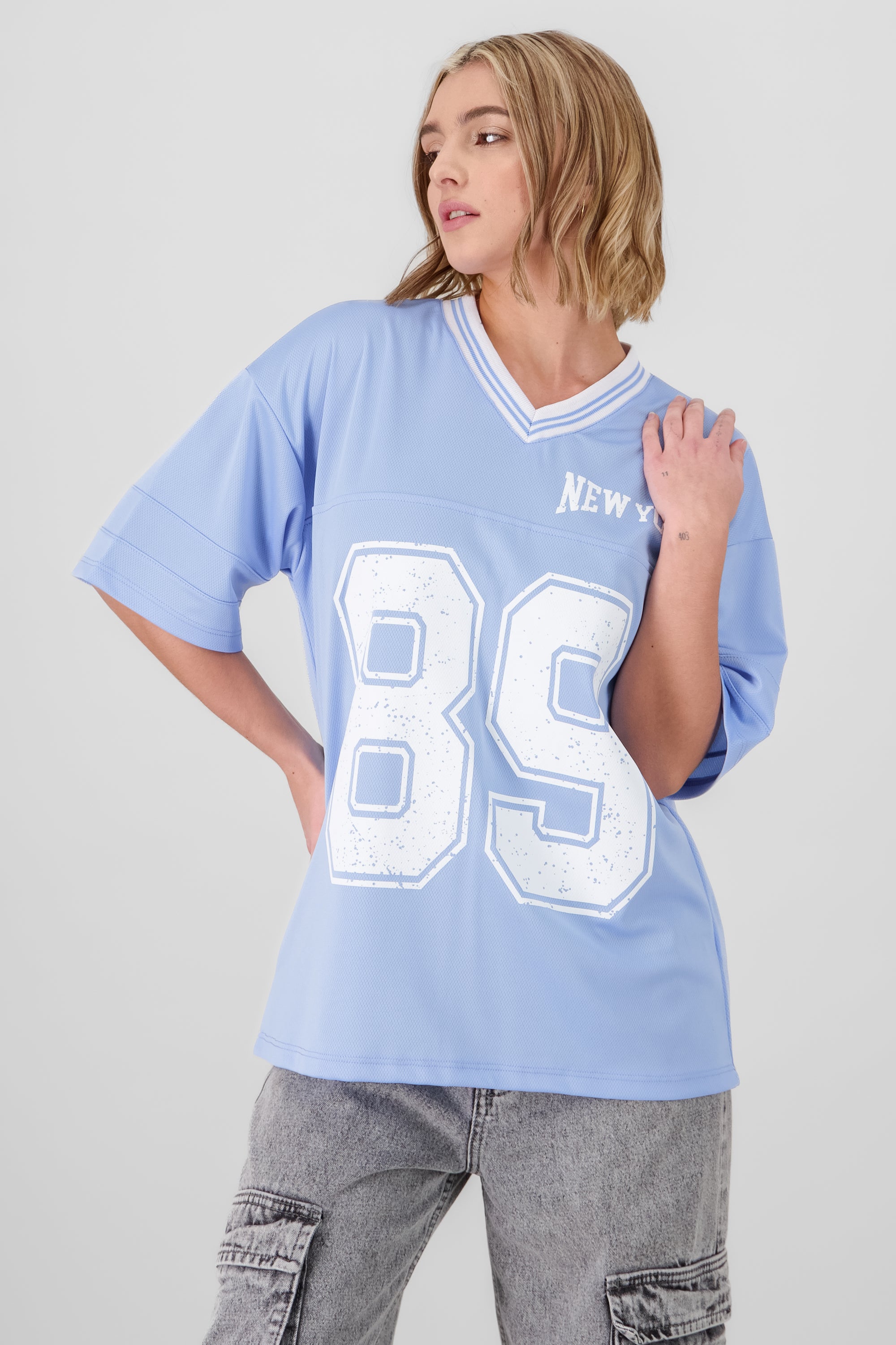 Playera oversize estampado numero AZUL PASTEL