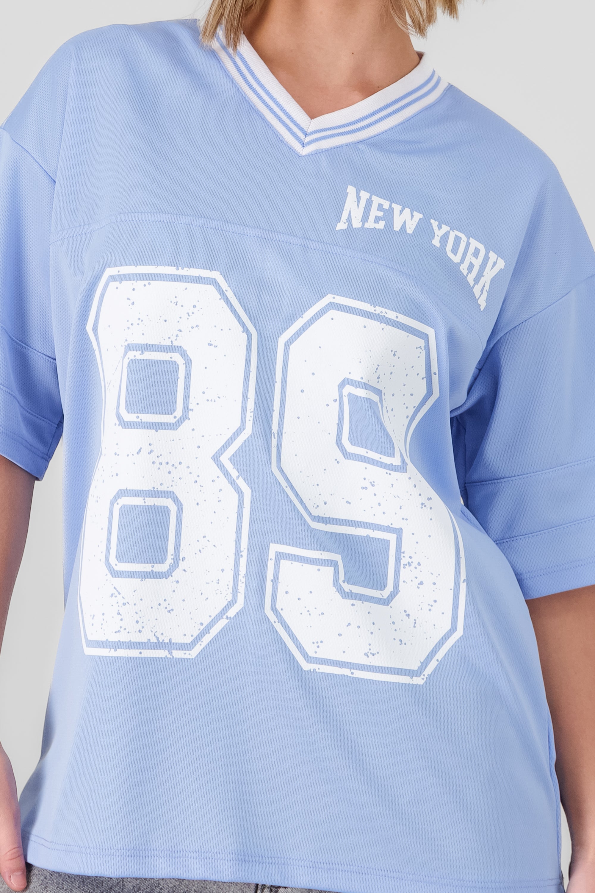 Playera oversize estampado numero AZUL PASTEL