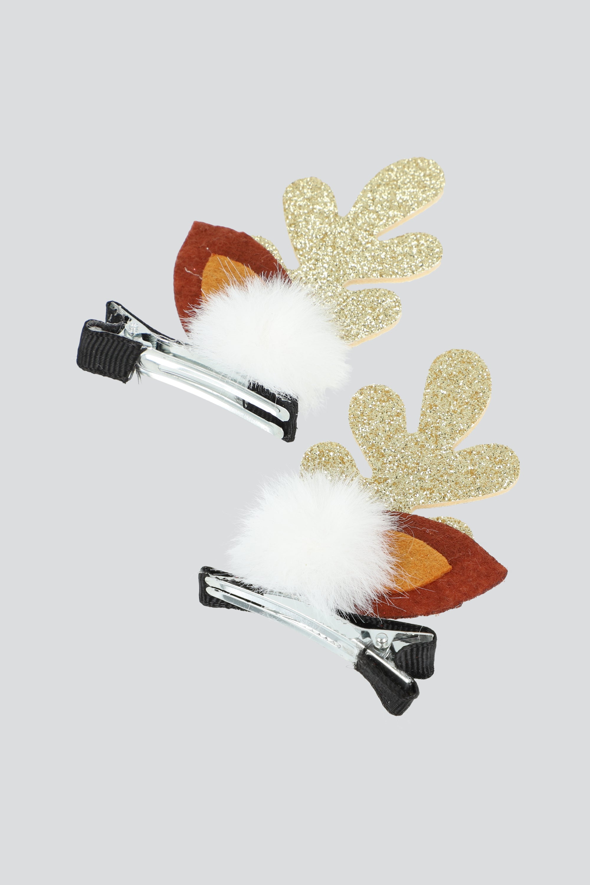 Broches cuernos glitter ORO