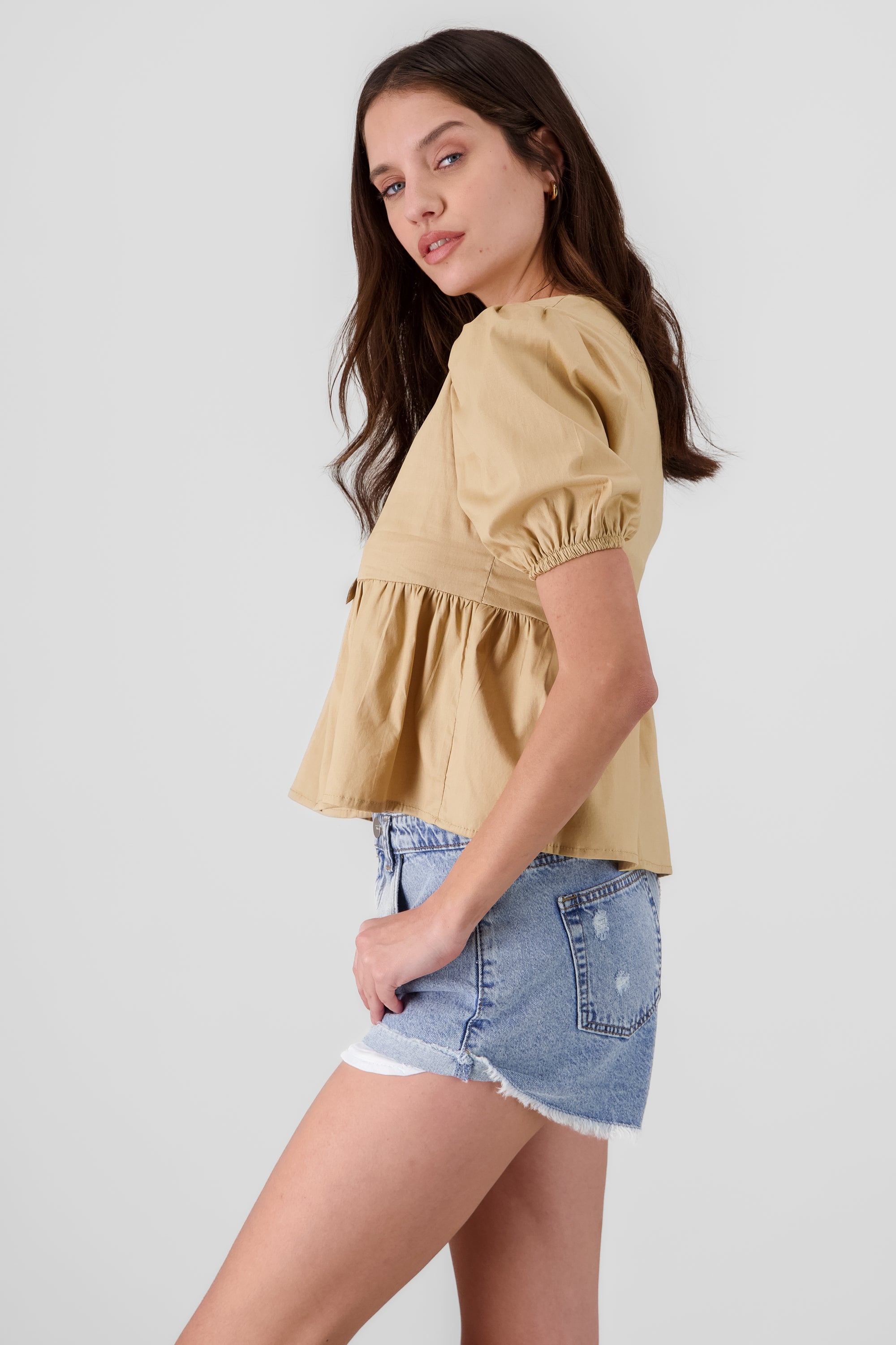 Blusa mangas abullonadas detalle moños TAN