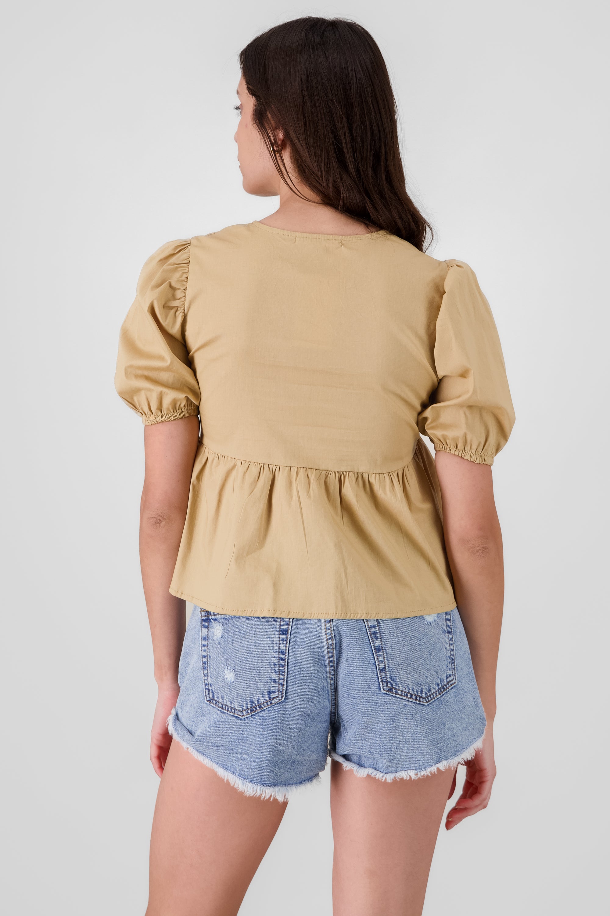 Blusa mangas abullonadas detalle moños TAN