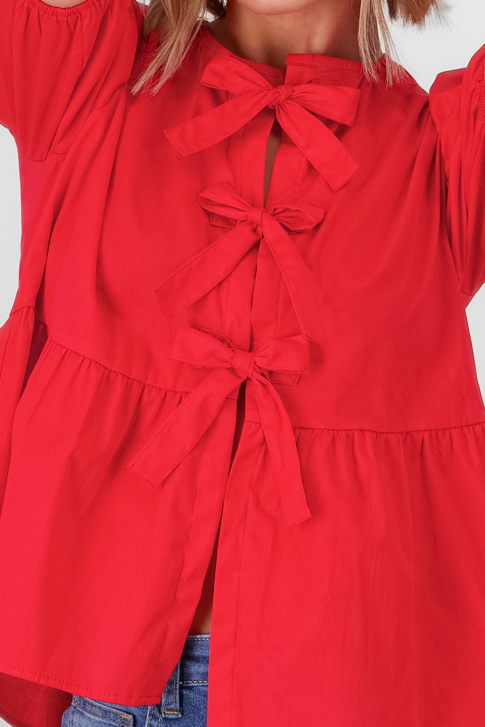 Blusa mangas abullonadas detalle moños ROJO