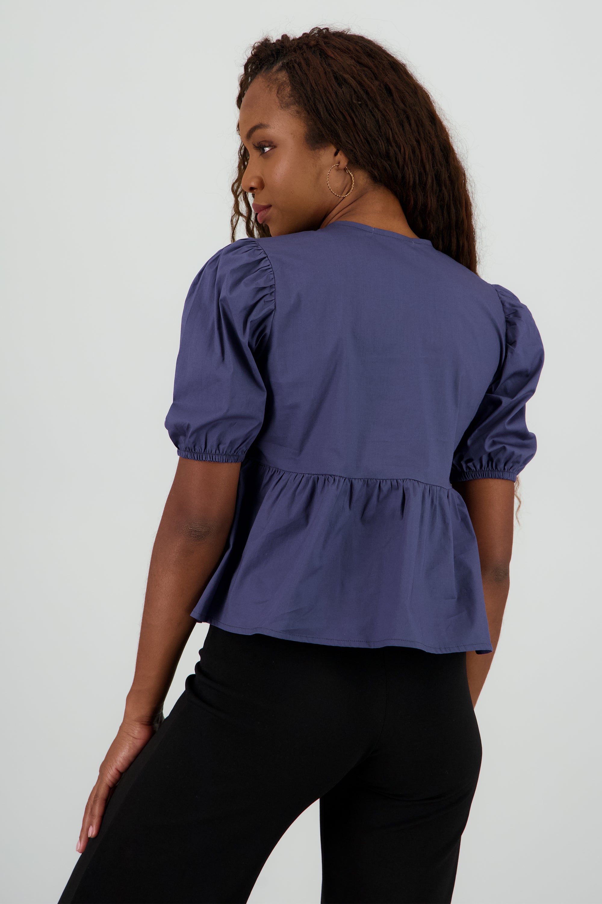 Blusa mangas abullonadas detalle moños INDIGO