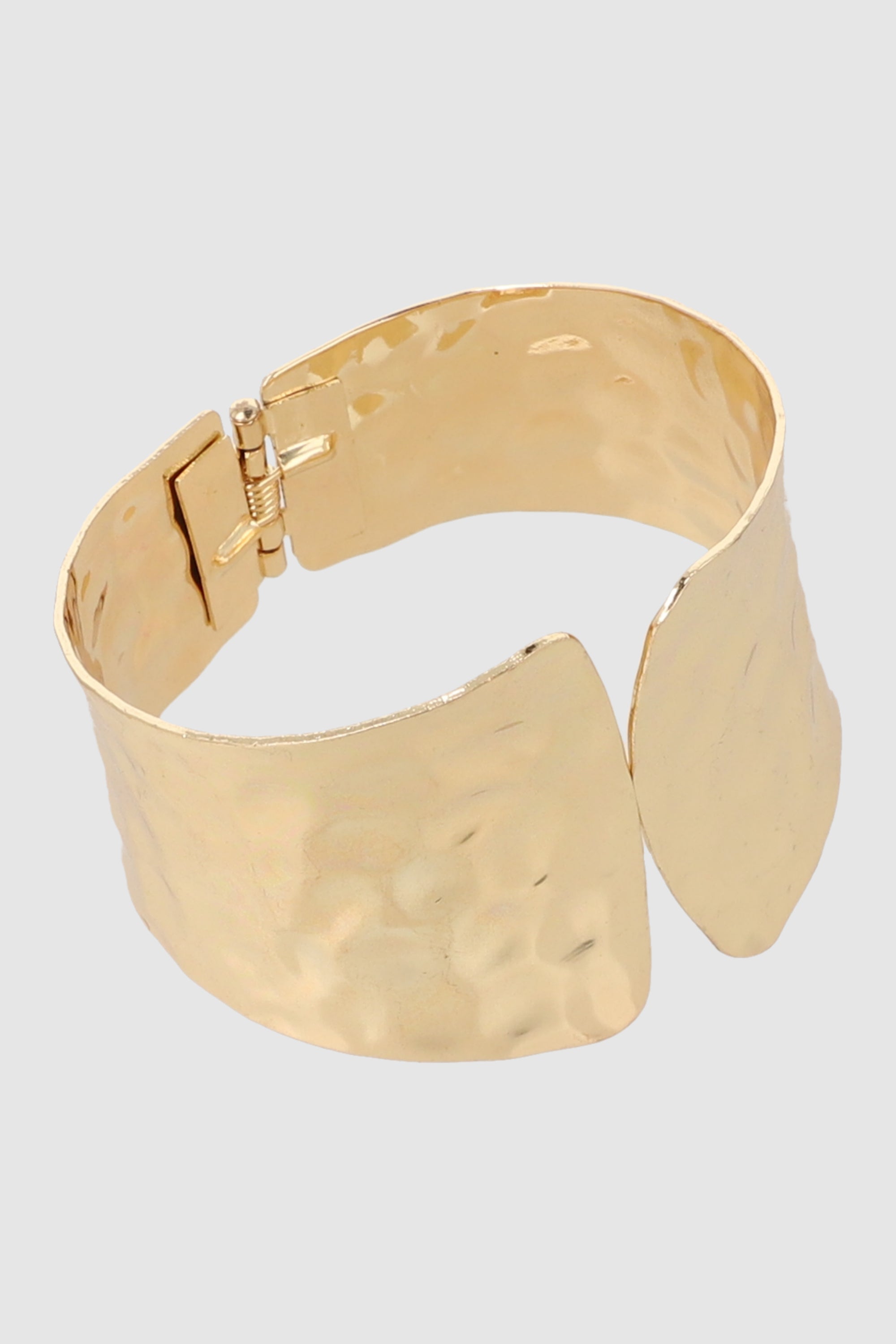 CUFF GRUESO MARTELINADO ORO