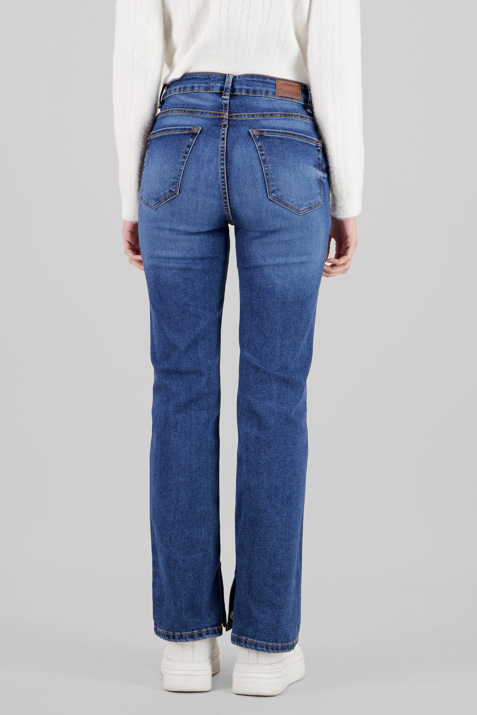 Jeans bootcut con abertura STONE