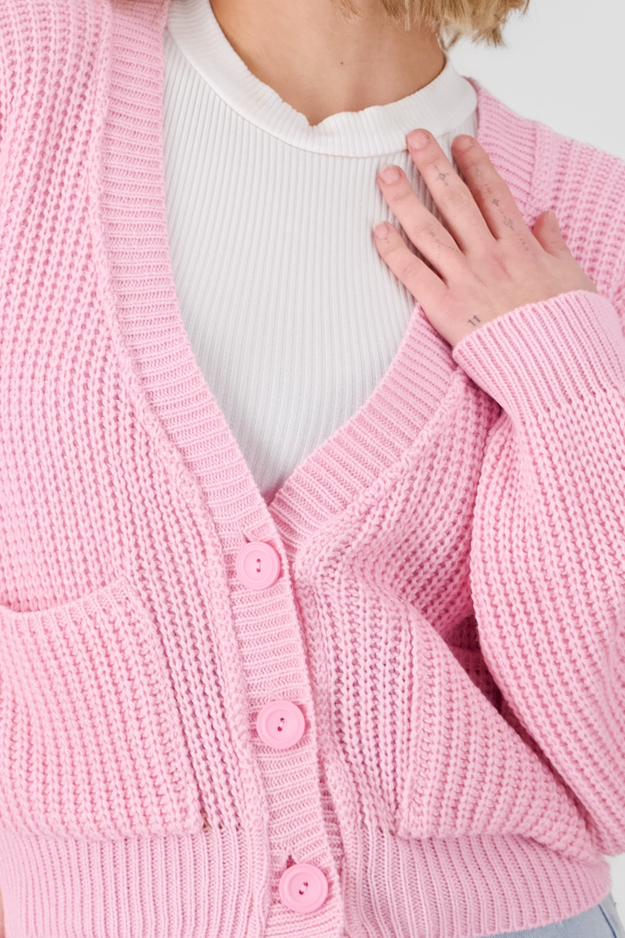 Cardigan corto detalle bolsas ROSA PASTEL