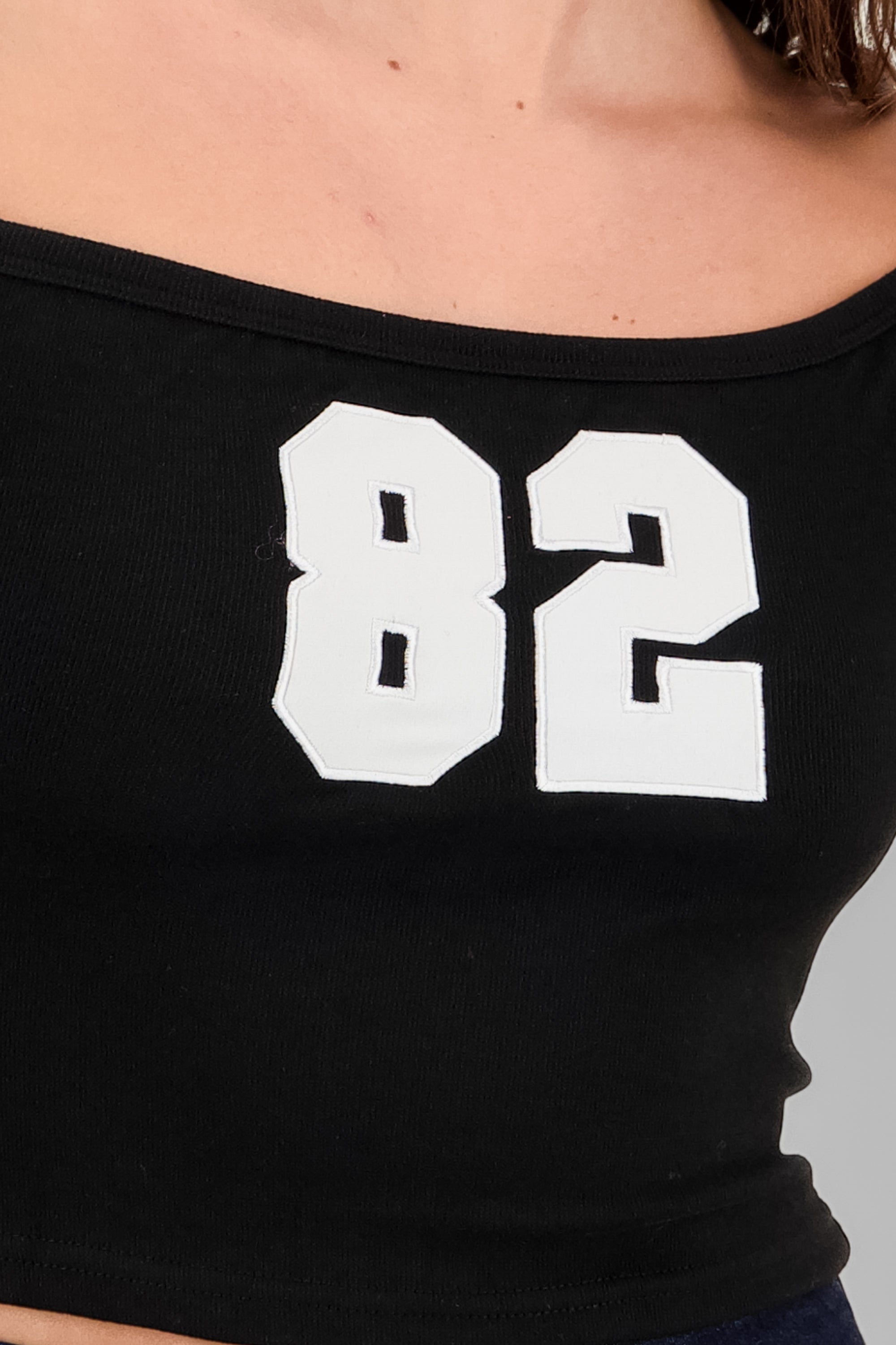 Top sin hombros rib contraste con estampado NEGRO COMBO