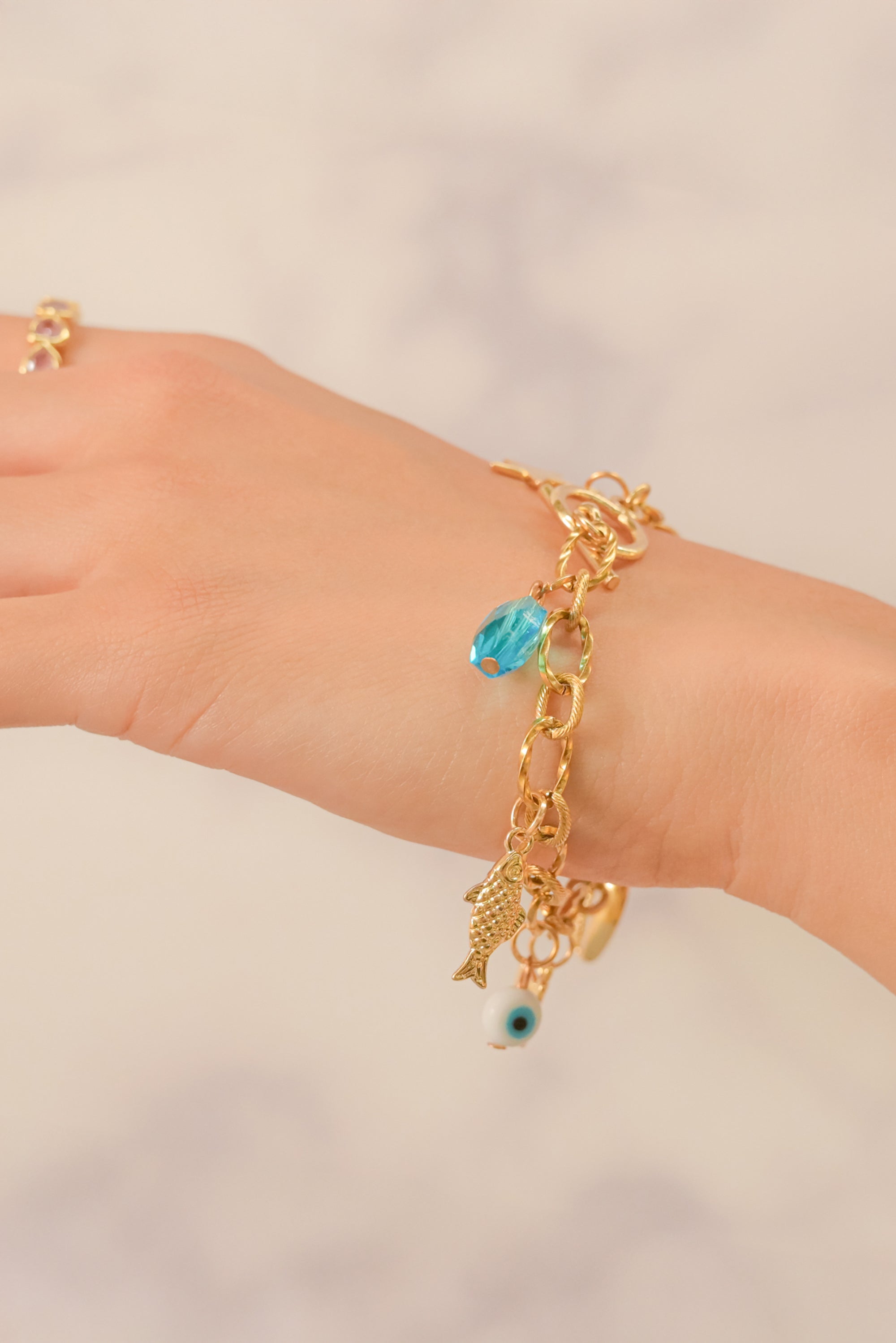 Pulsera multi charms ORO