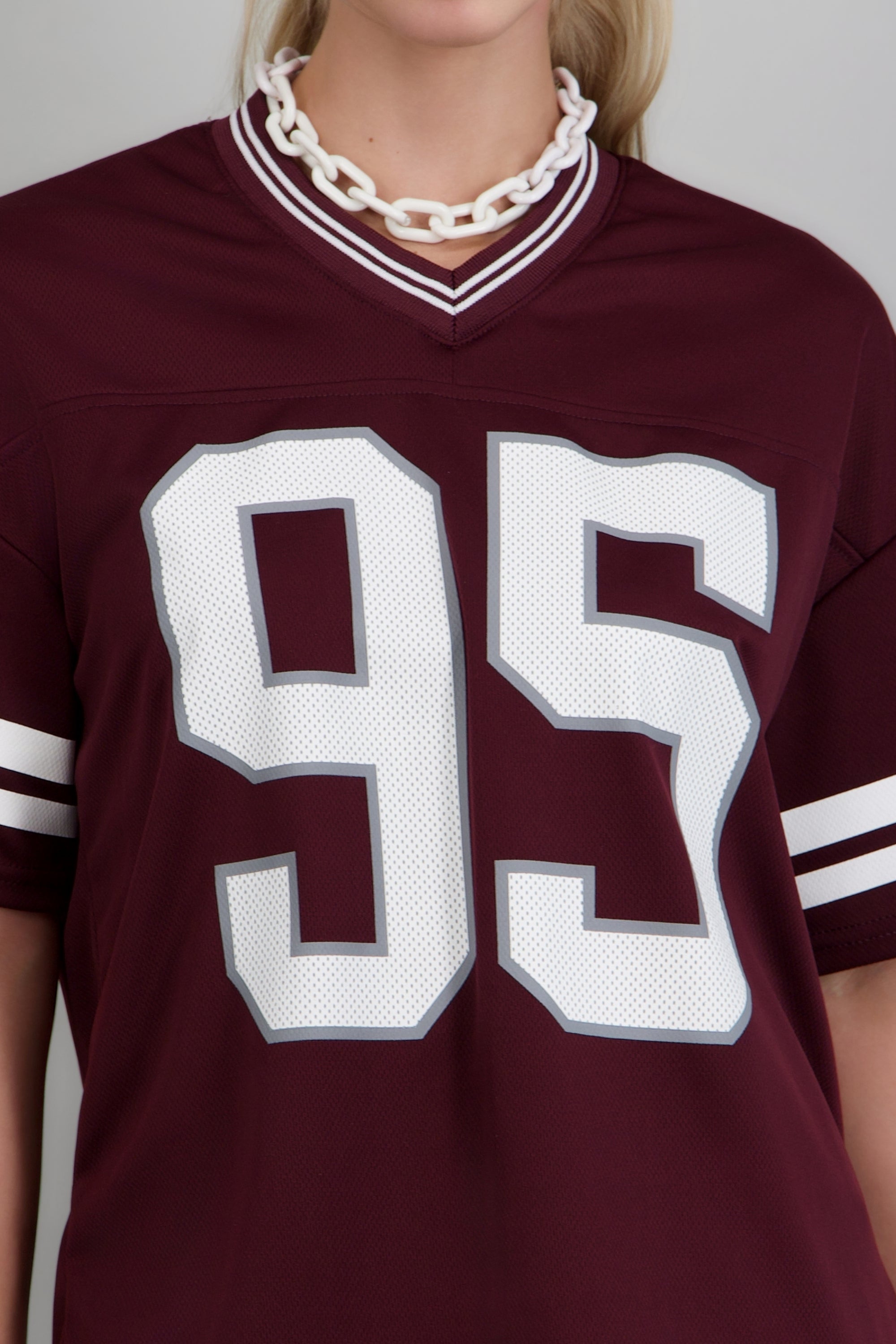 Playera deportiva estampado numeros ROJO QUEMADO