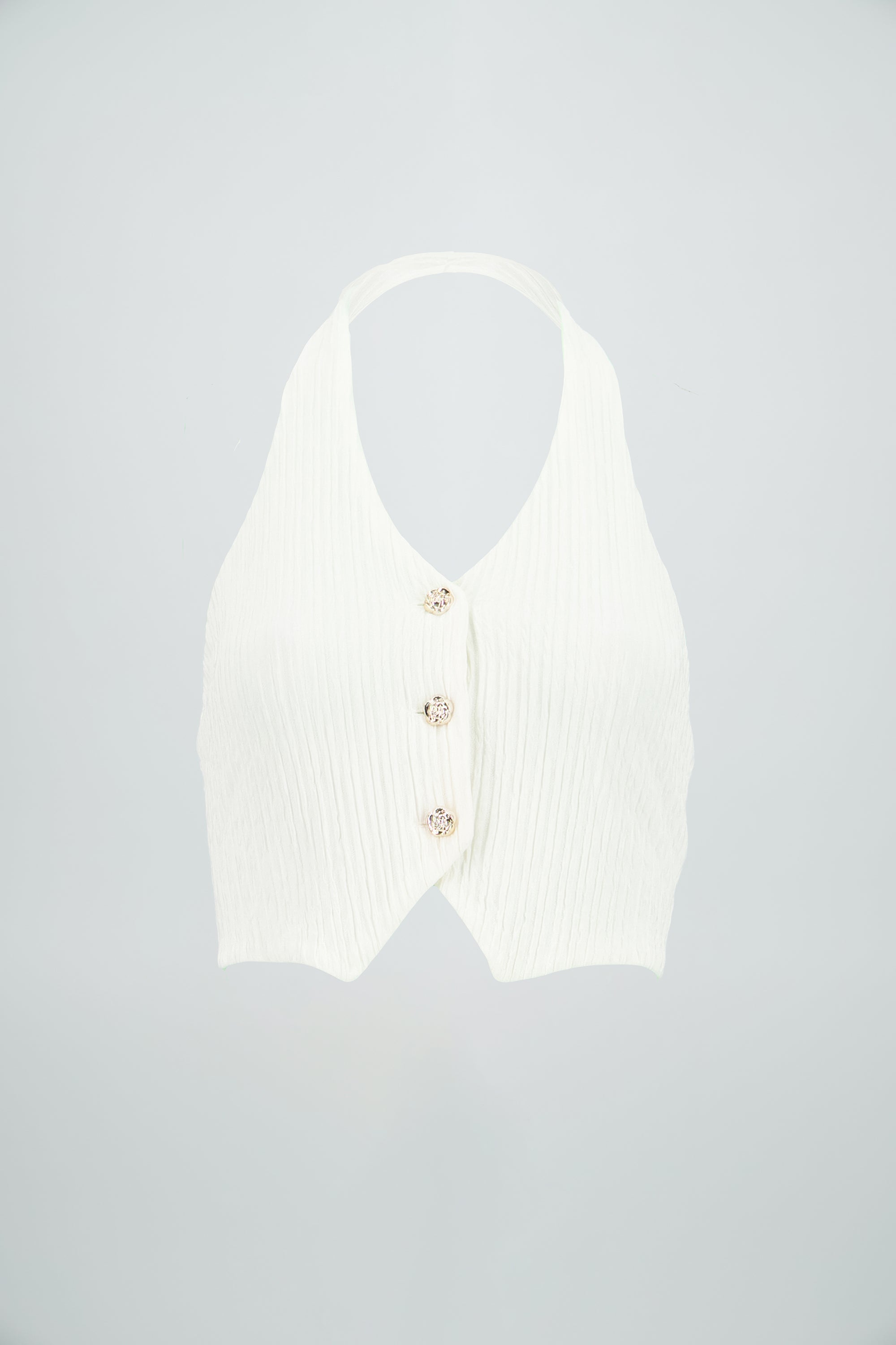 Top halter botones textura