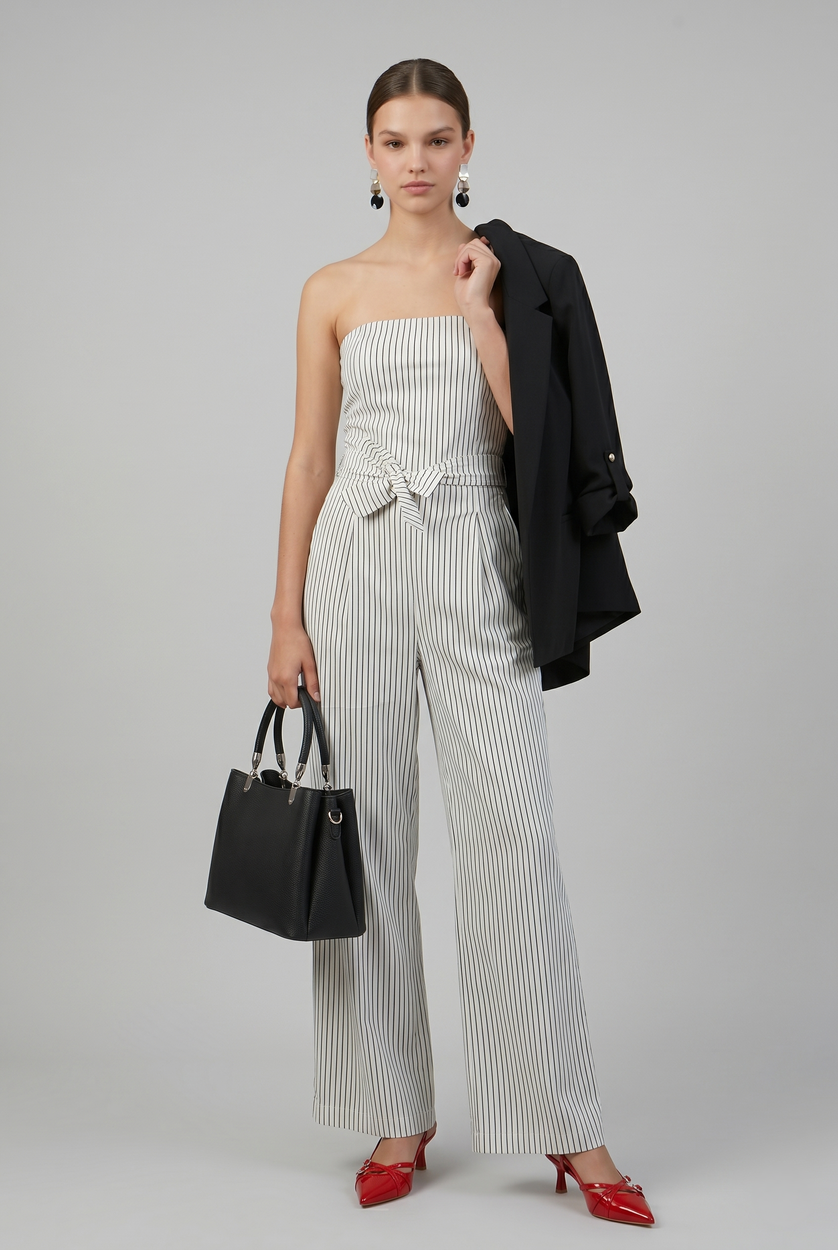 Jumpsuit strapless rayas detalle laso BLANCO COMBO