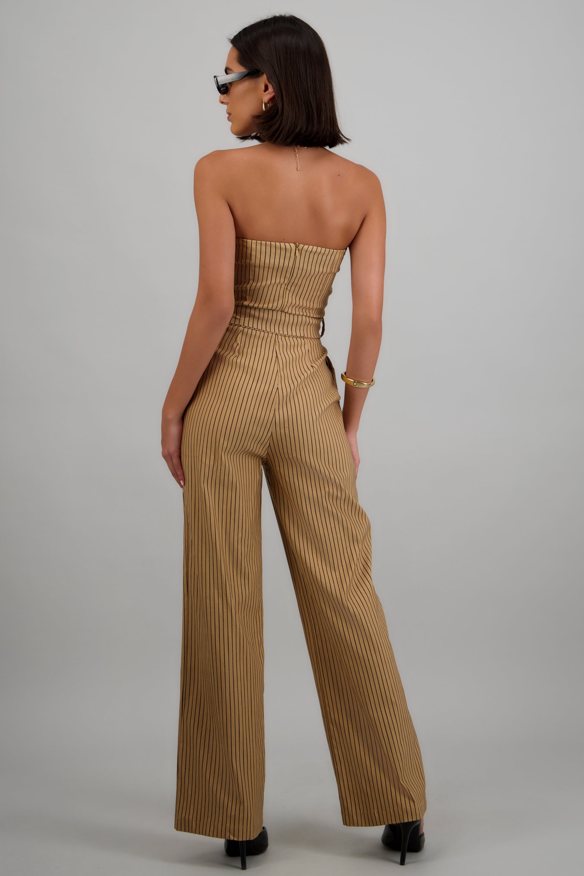 Jumpsuit strapless rayas detalle laso CAMELLO