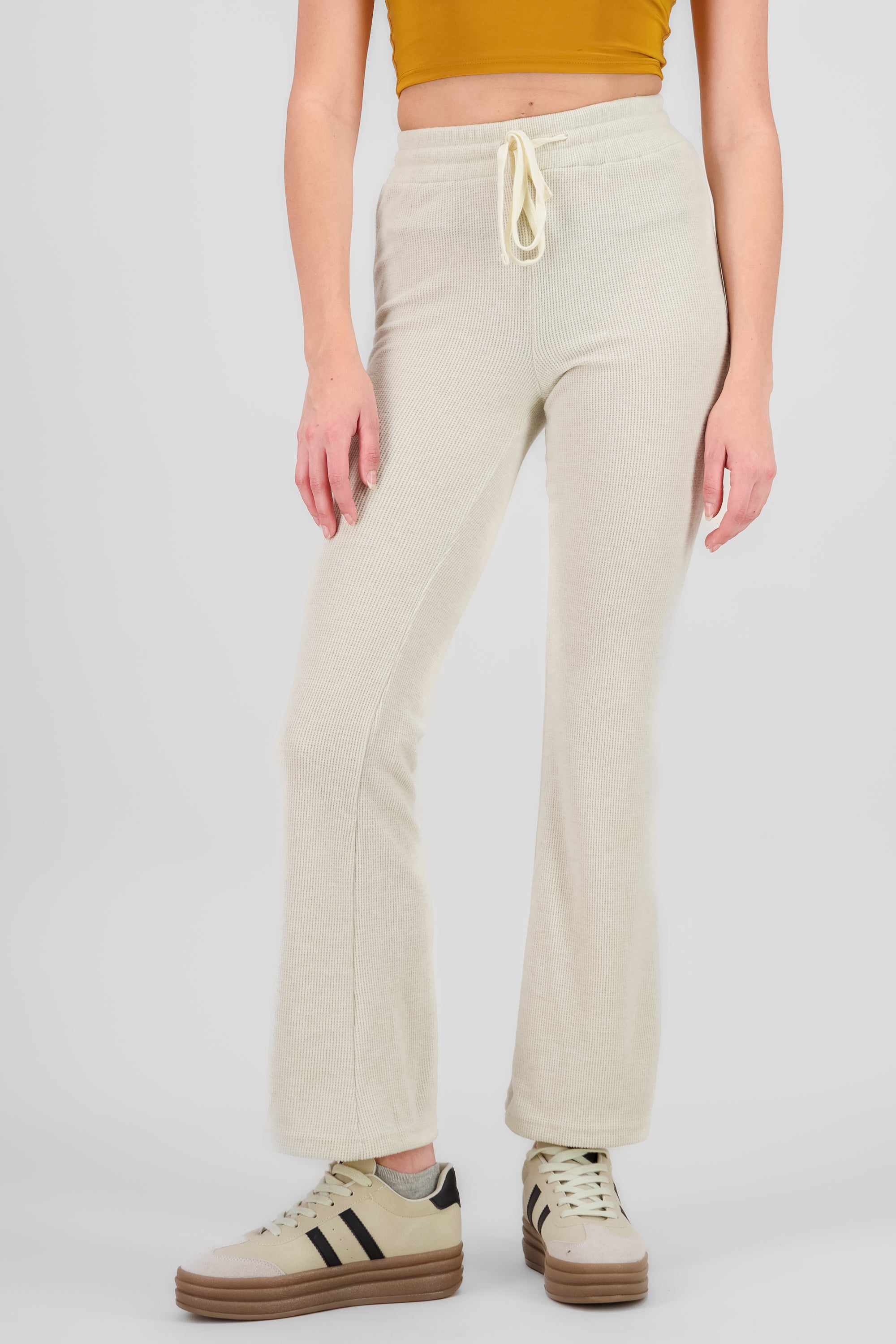 Pantalones tejidos flare CREMA