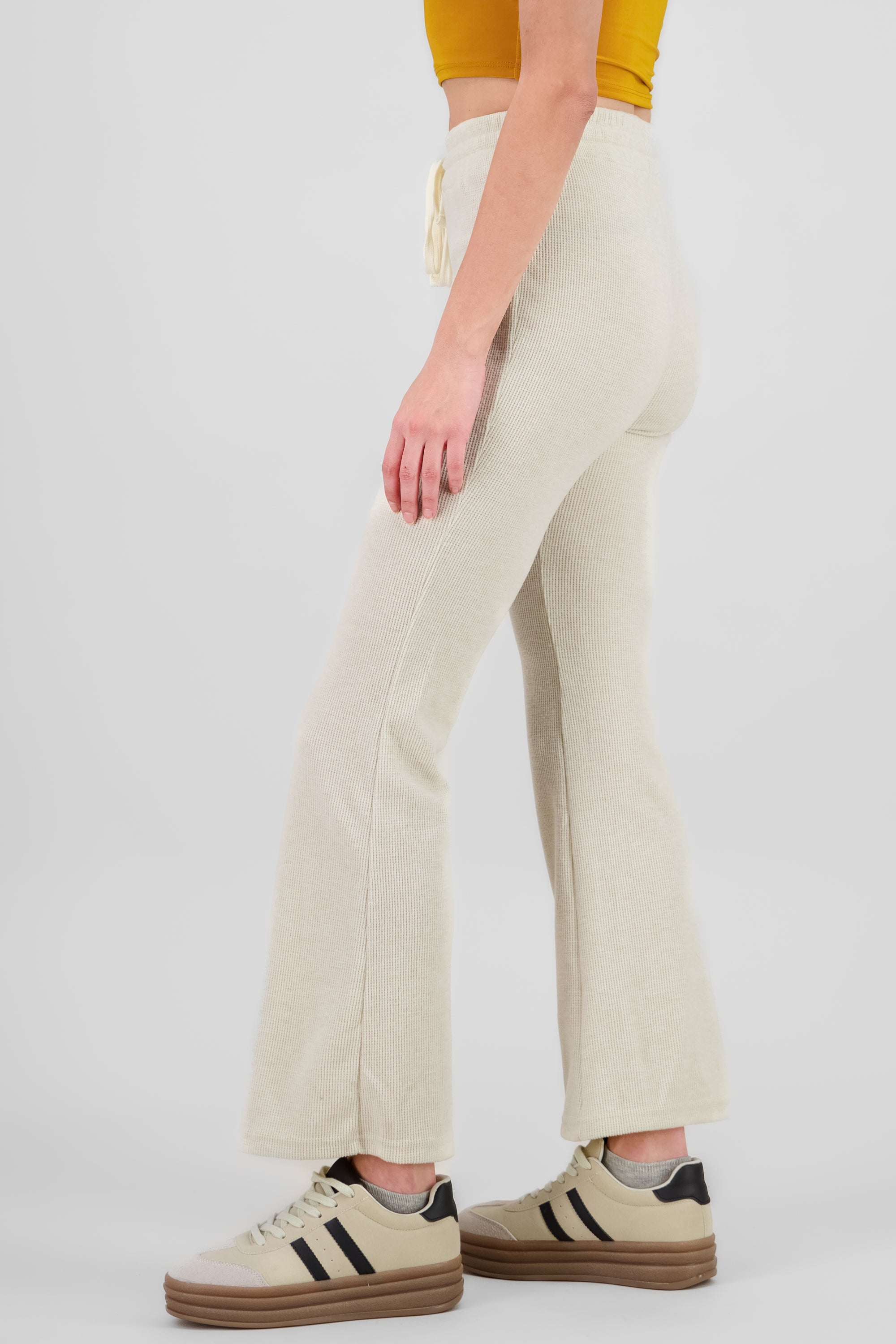 Pantalones tejidos flare CREMA