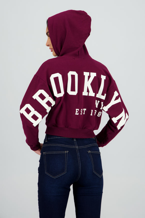 Sudadera crop cierre estampado espalda