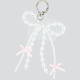 Charm para cel doble moño perla
