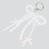 Charm para cel doble moño perla
