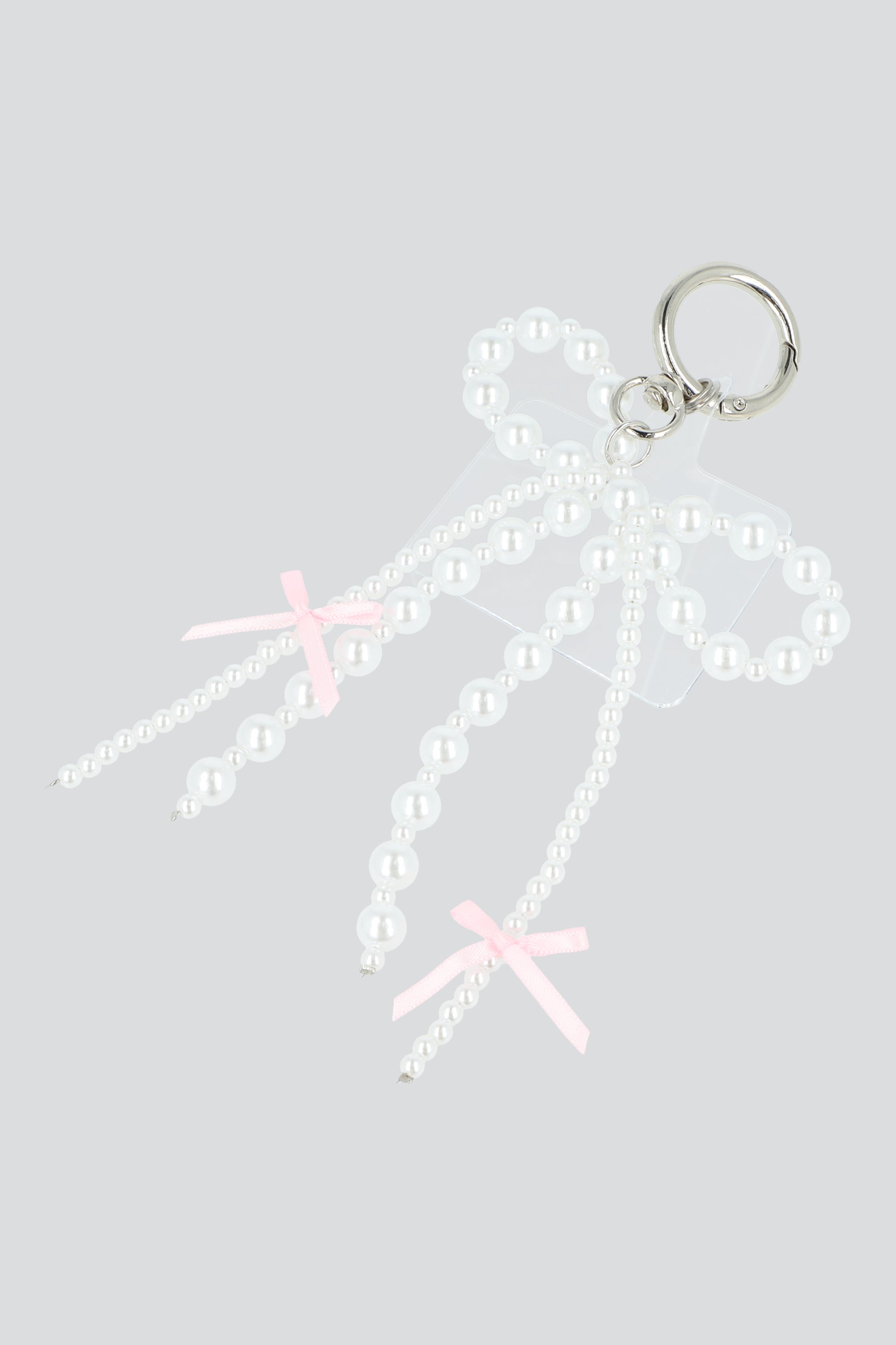 Charm para cel doble moño perla BLANCO