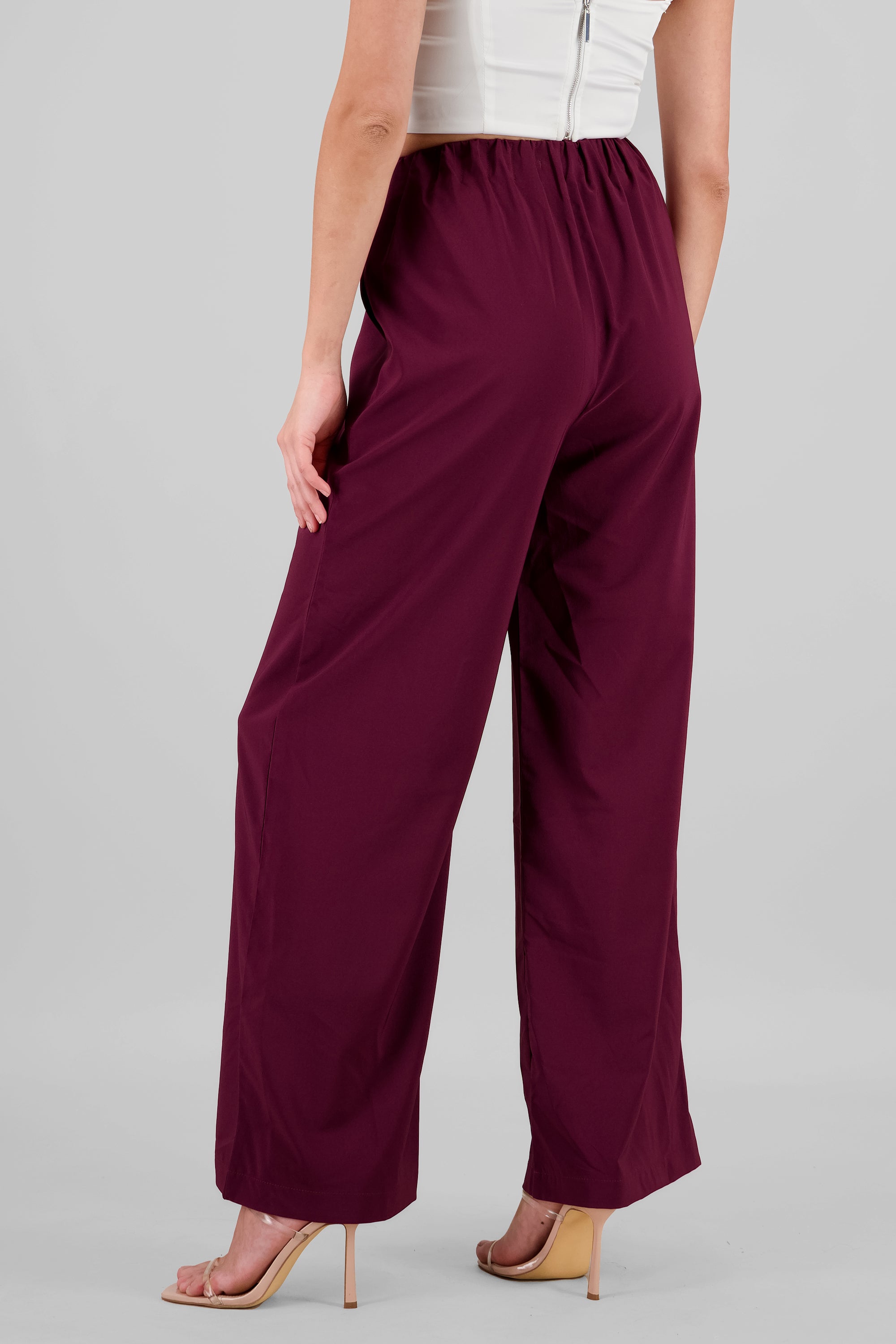 Pantalon amplio liso detalle resorte VINO