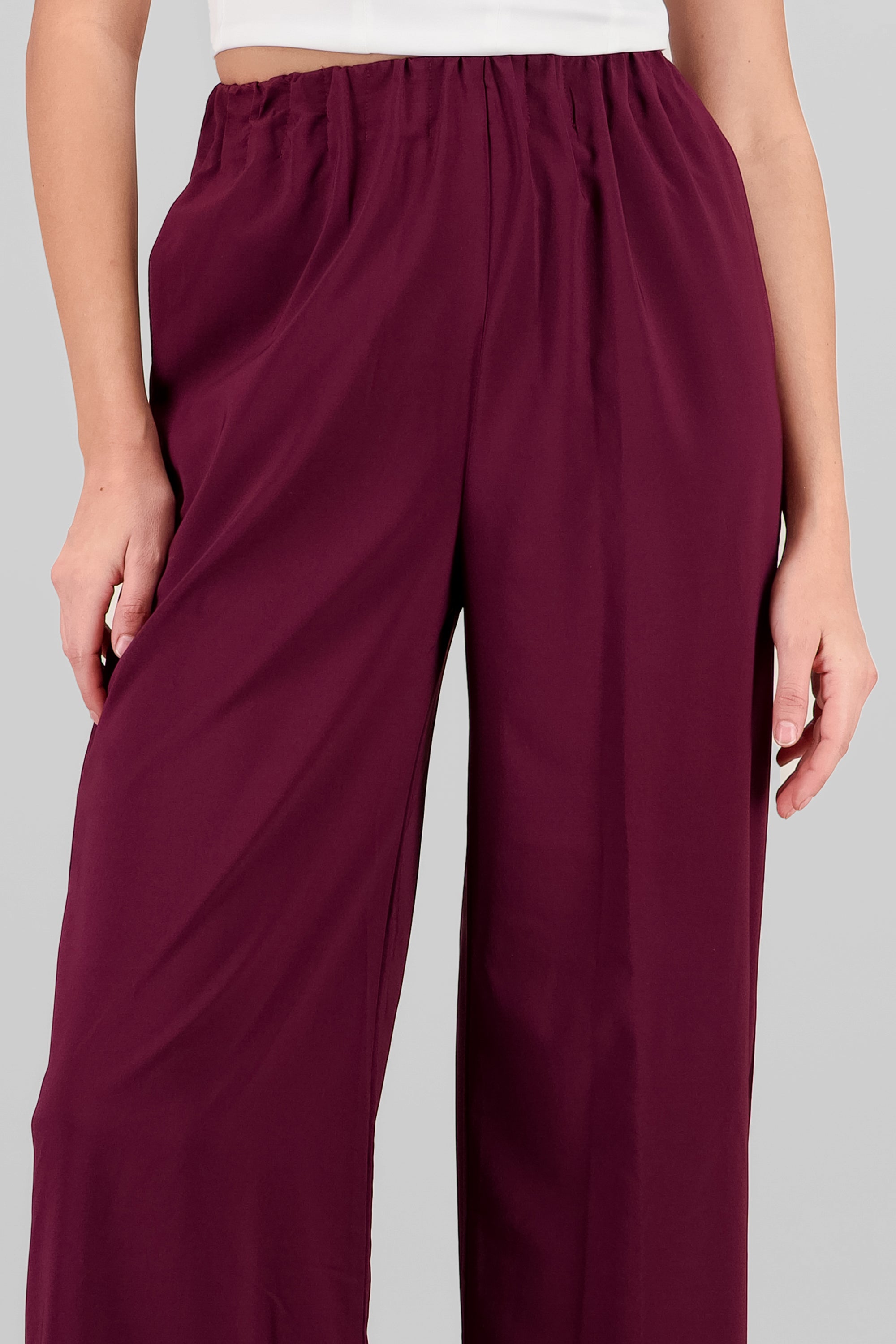 Pantalon amplio liso detalle resorte VINO