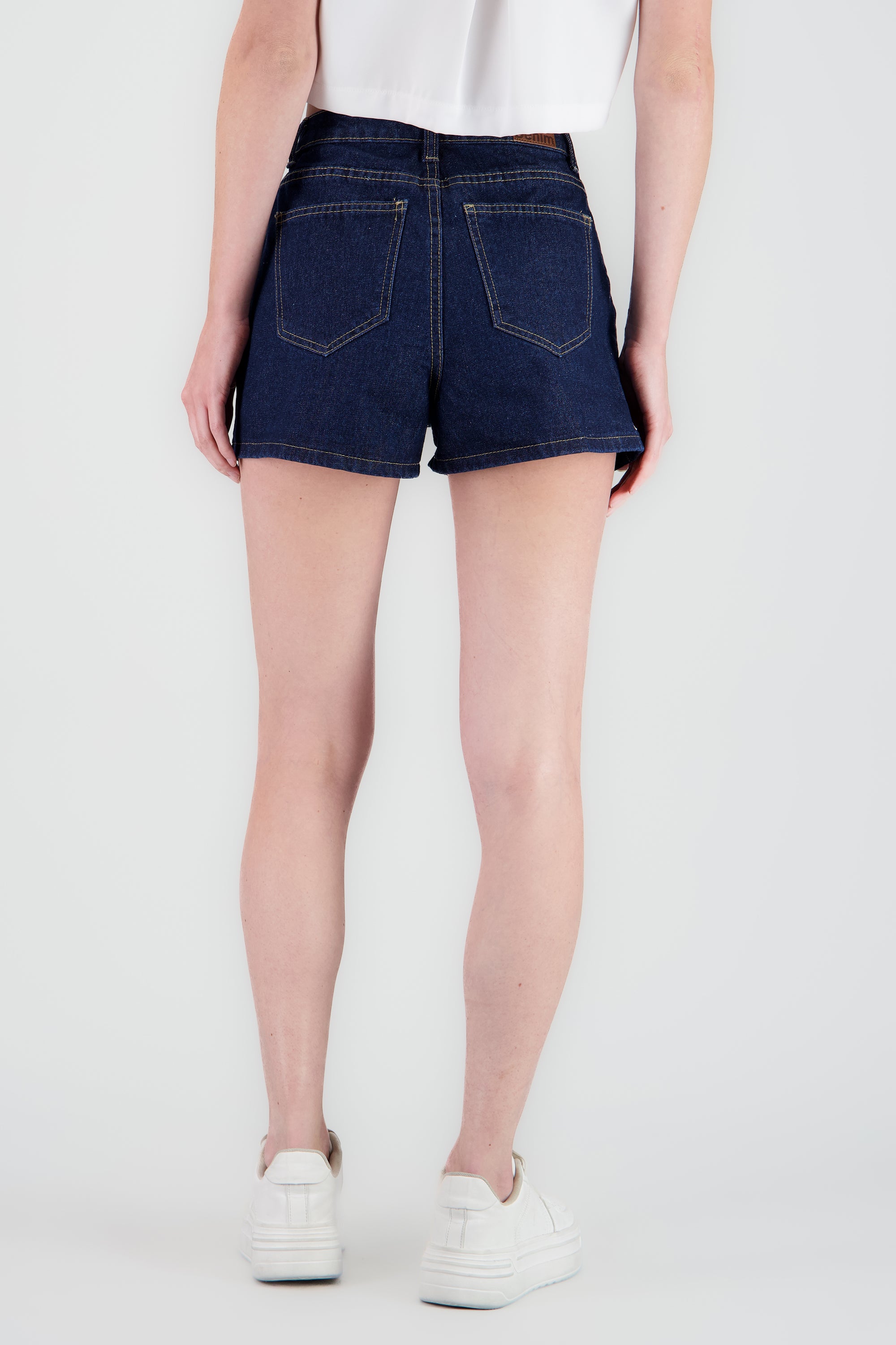 Short liso bolsas diagonal INDIGO