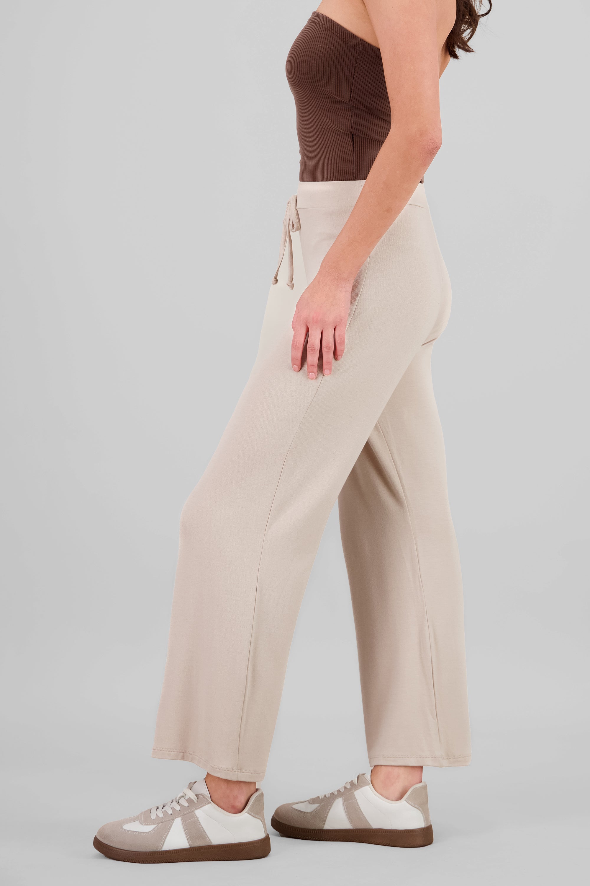 Pantalon liso fluido detalle moño