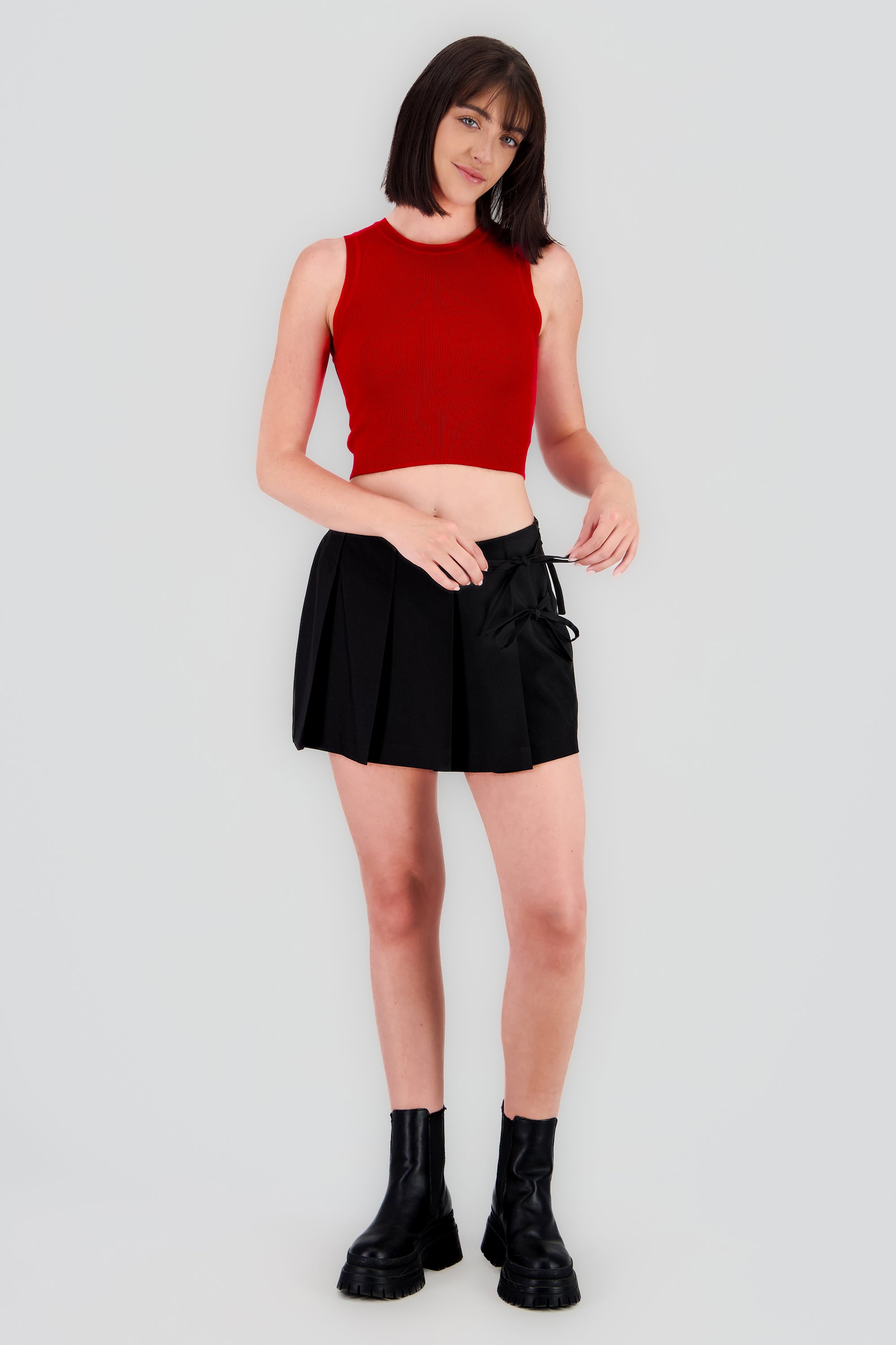 Falda mini tableada detalle moños NEGRO