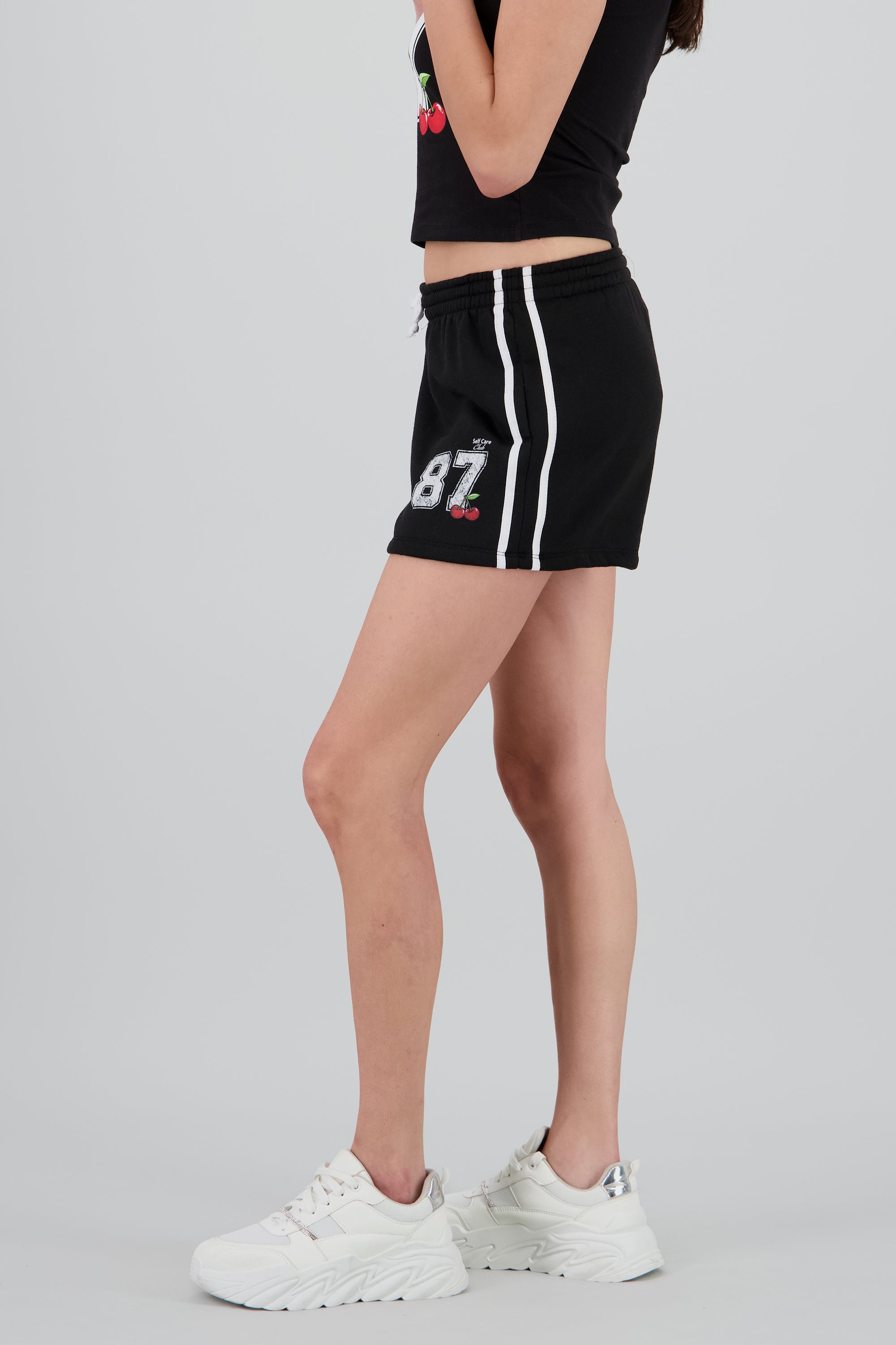 Short corto contraste con estampado NEGRO COMBO