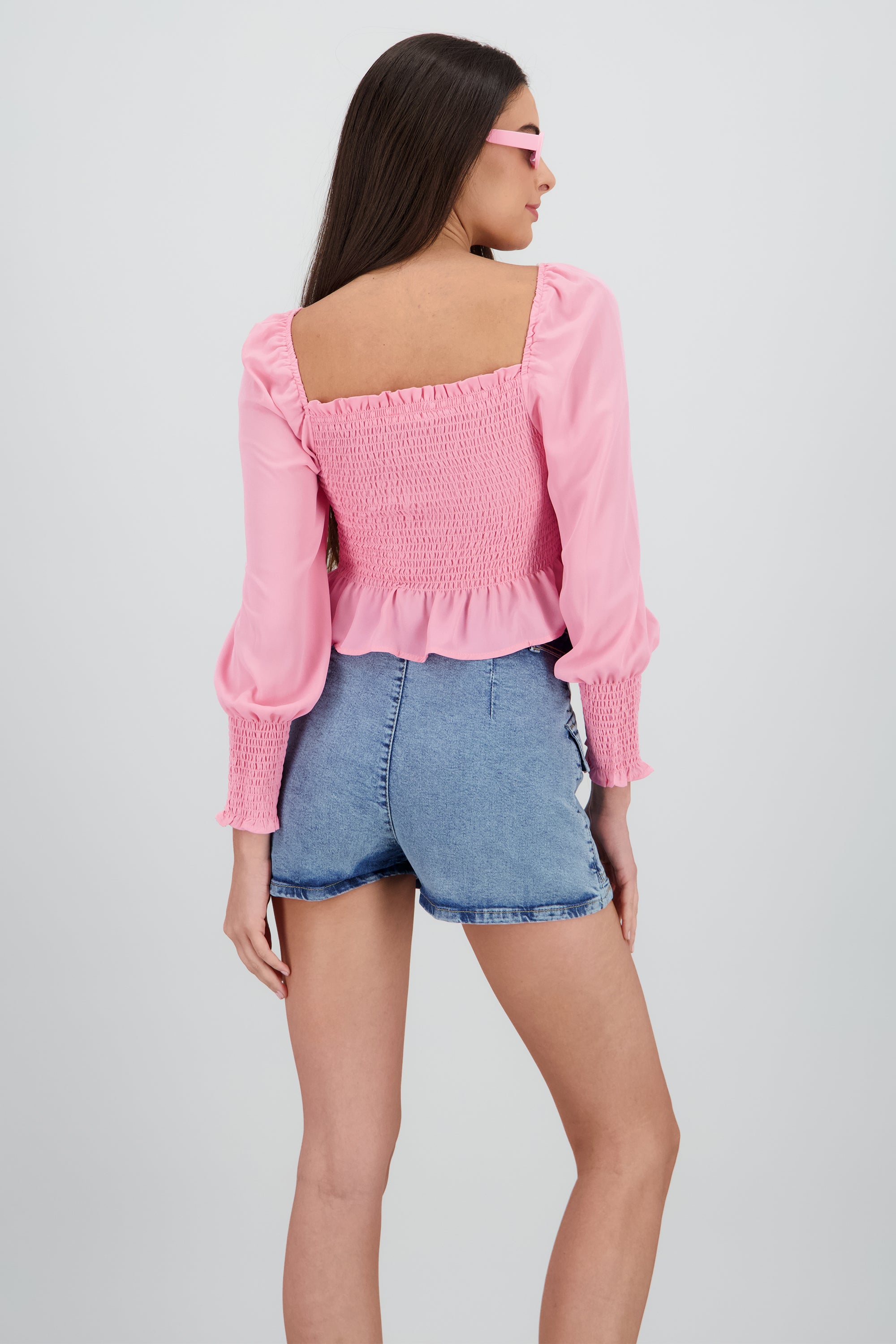 Top manga larga abullonada detalle smock ROSA