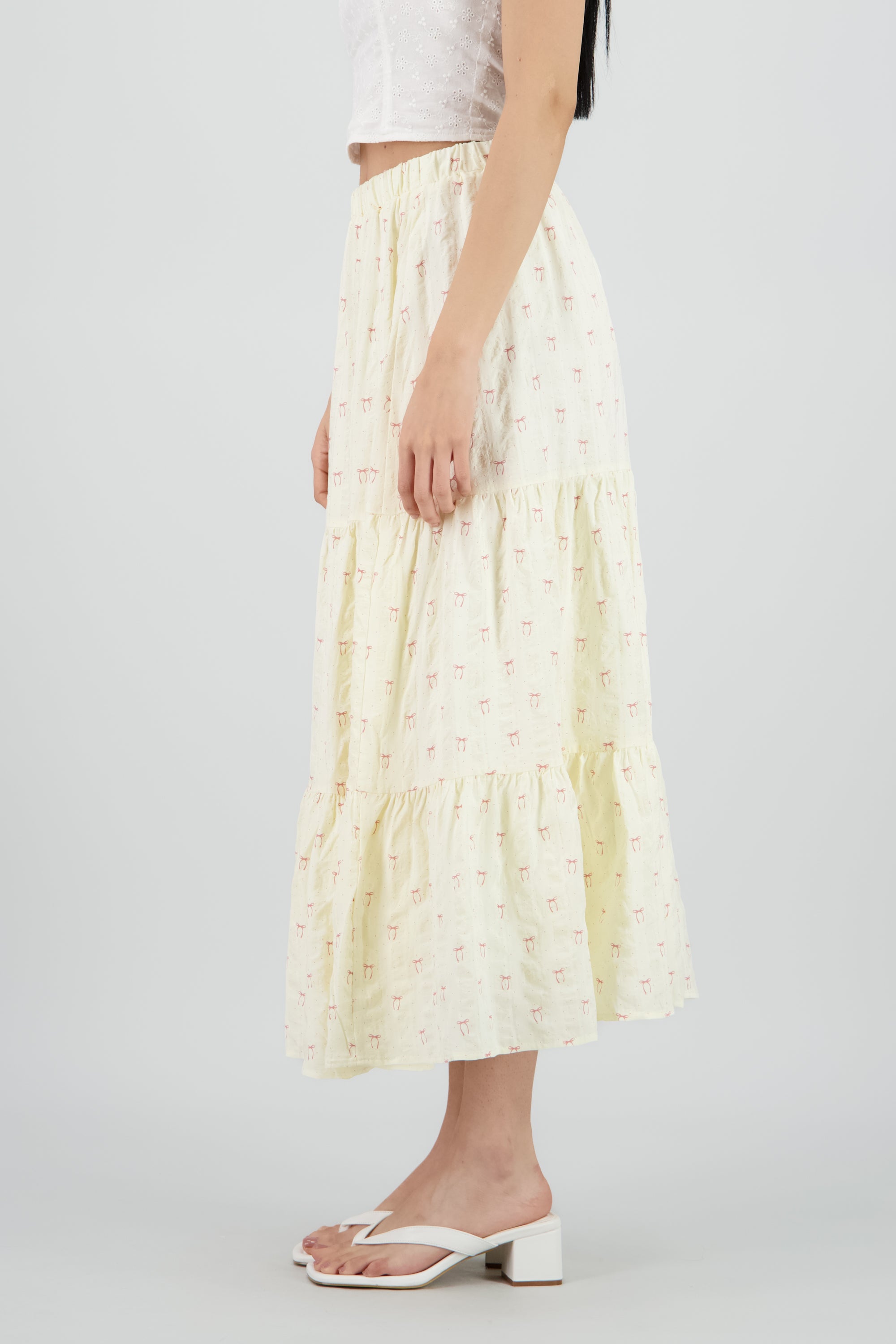 Falda midi estampado moños y polkas CREMA
