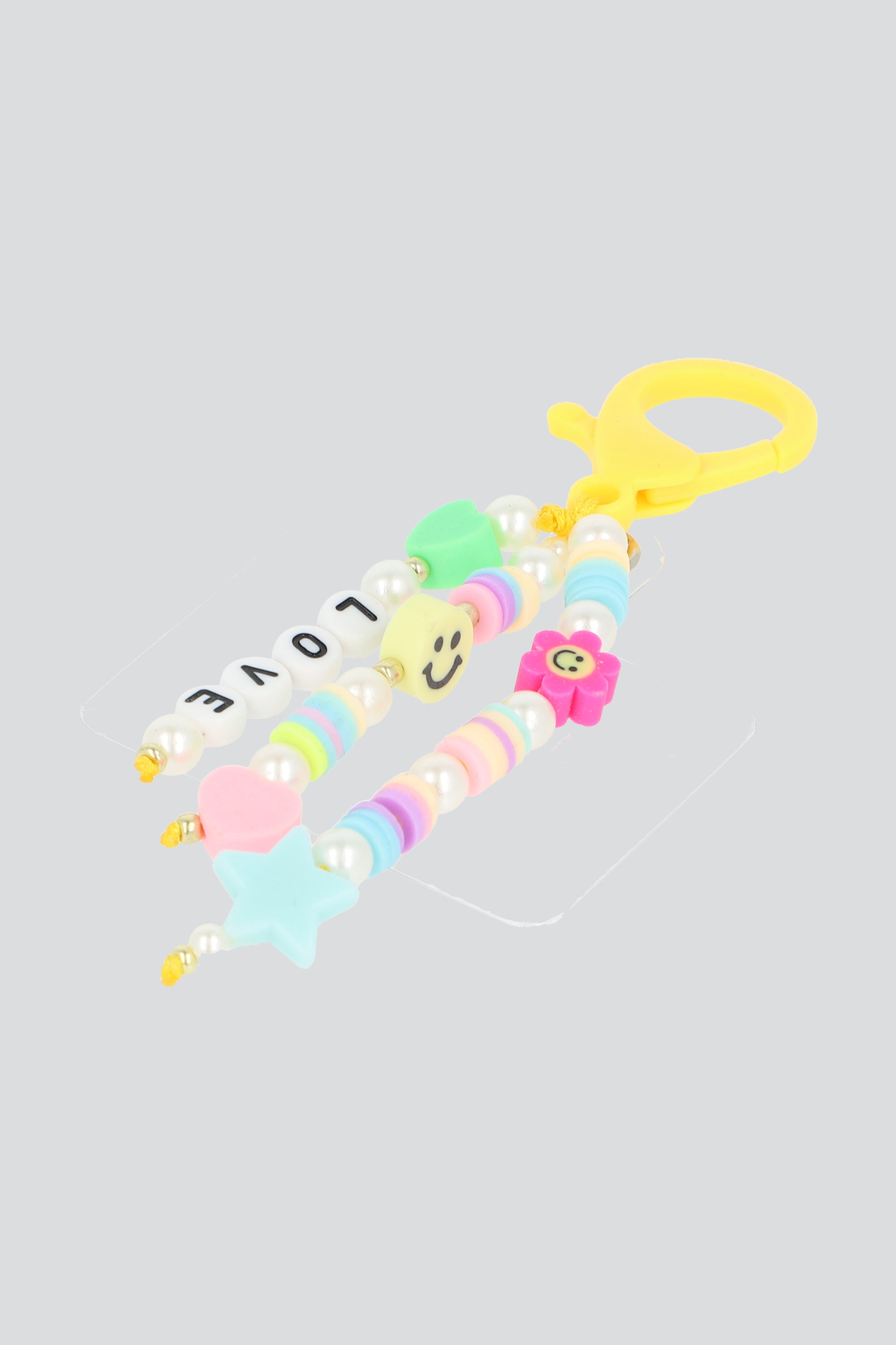 Charm para cel tiras multi AMARILLO
