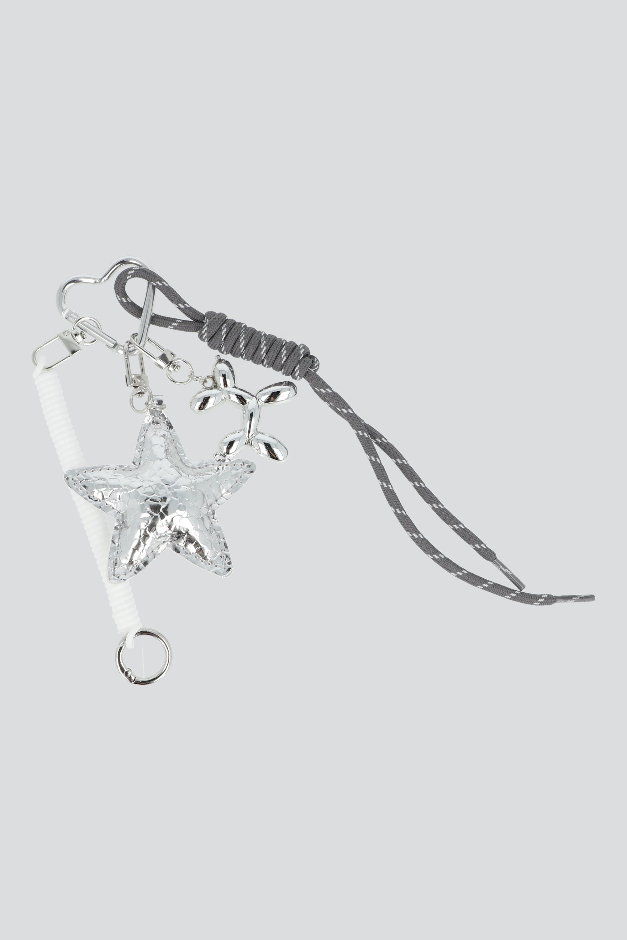 LLAVERO PERRO ESTRELLA METALICA PLATA