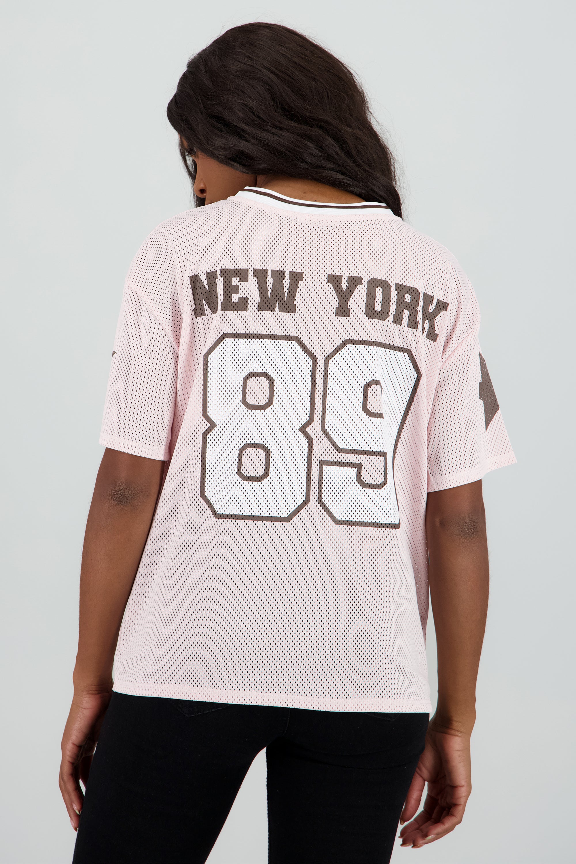 Playera oversize numero estrellas ny ROSA PASTEL