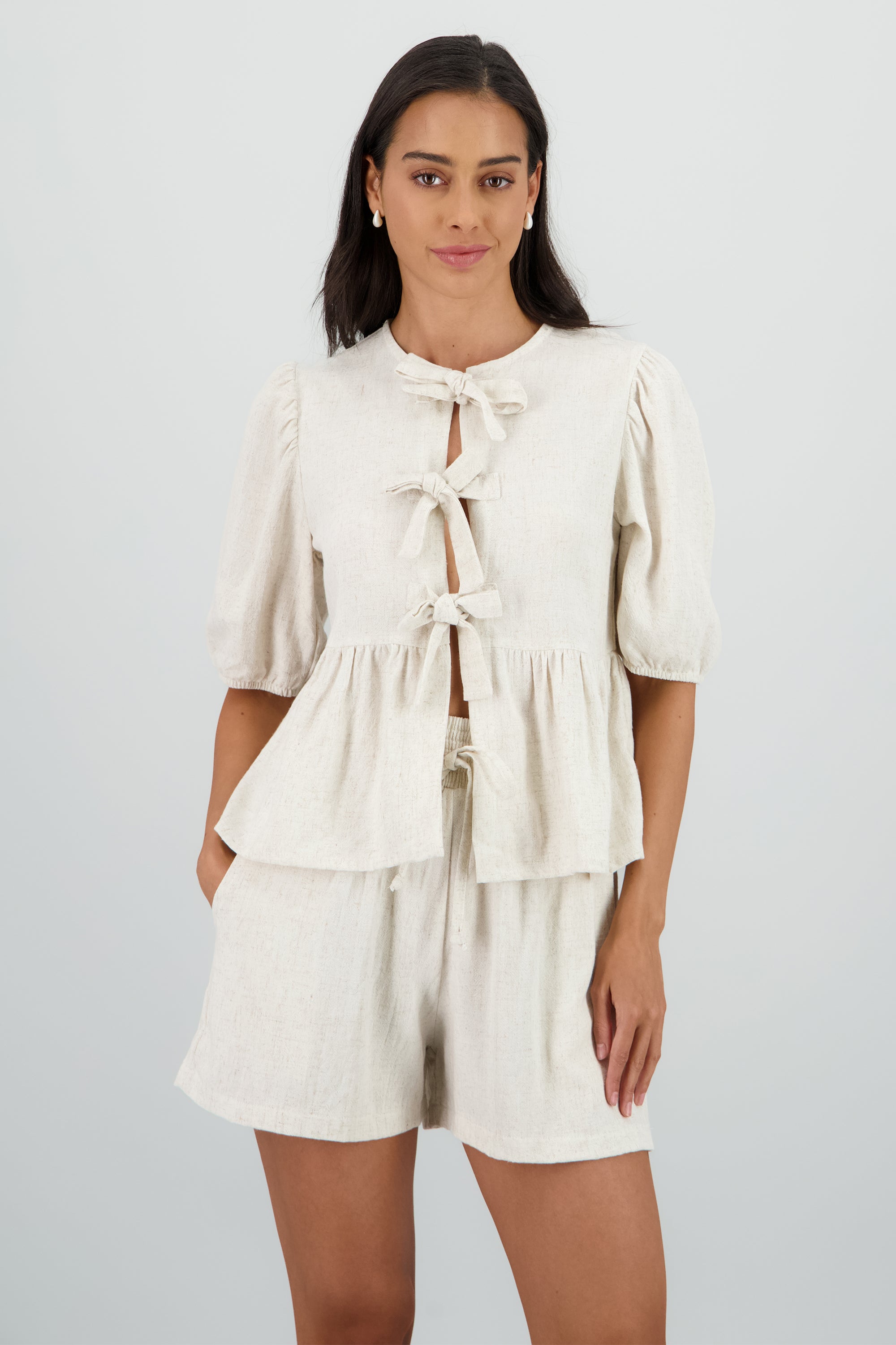 Blusa manga abullonada con moños BEIGE