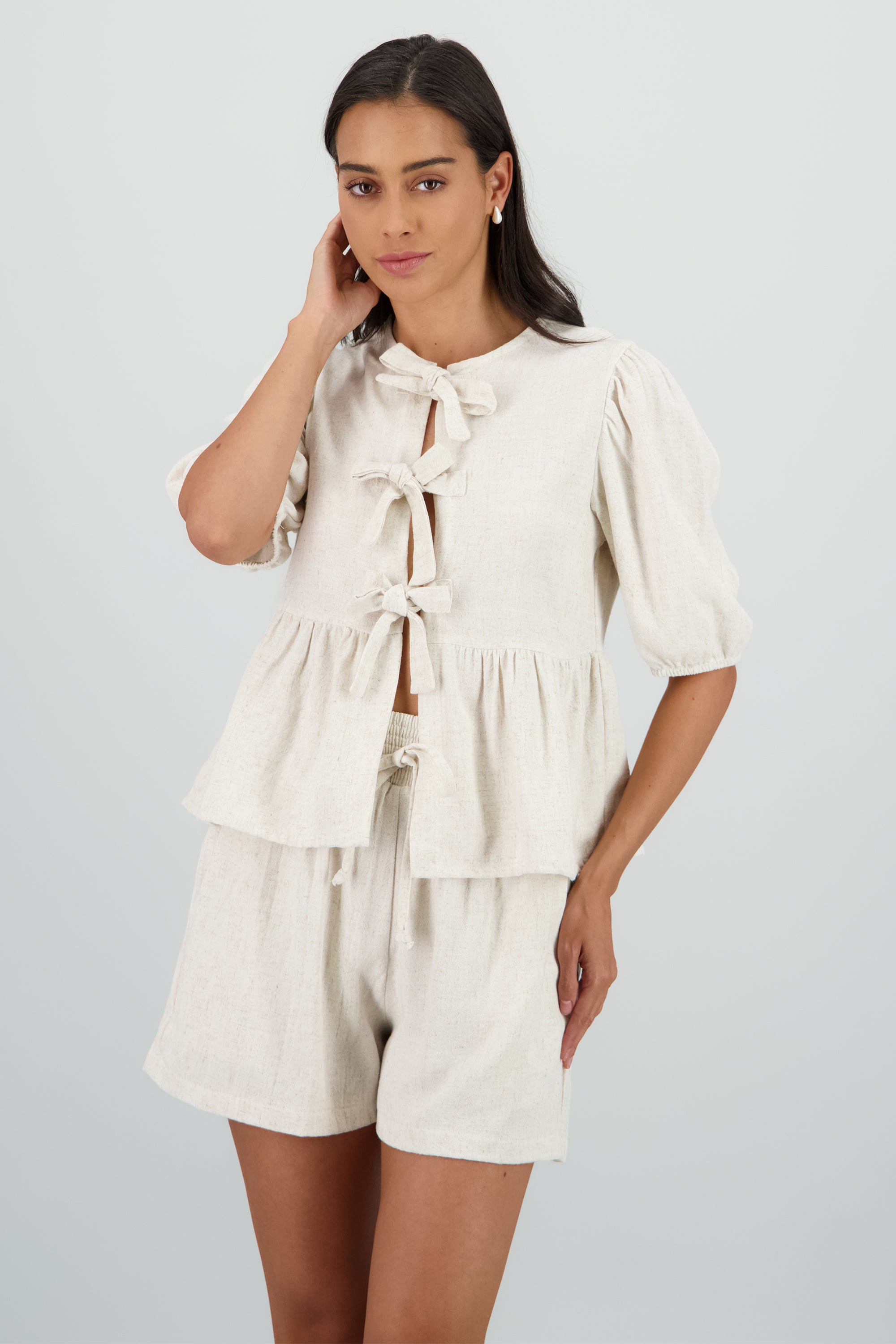 Blusa manga abullonada con moños BEIGE