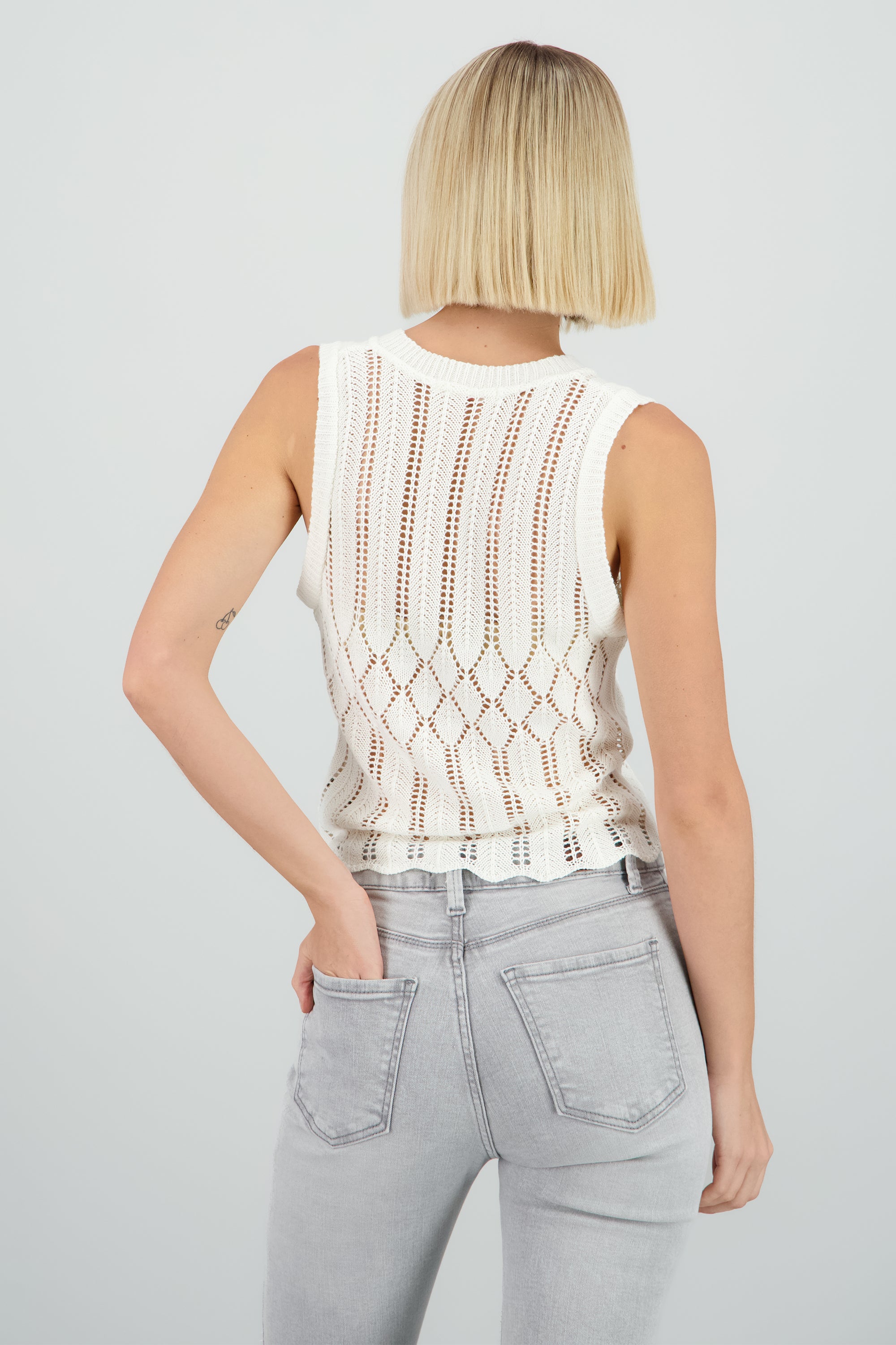 Chaleco calado detalle laso HUESO