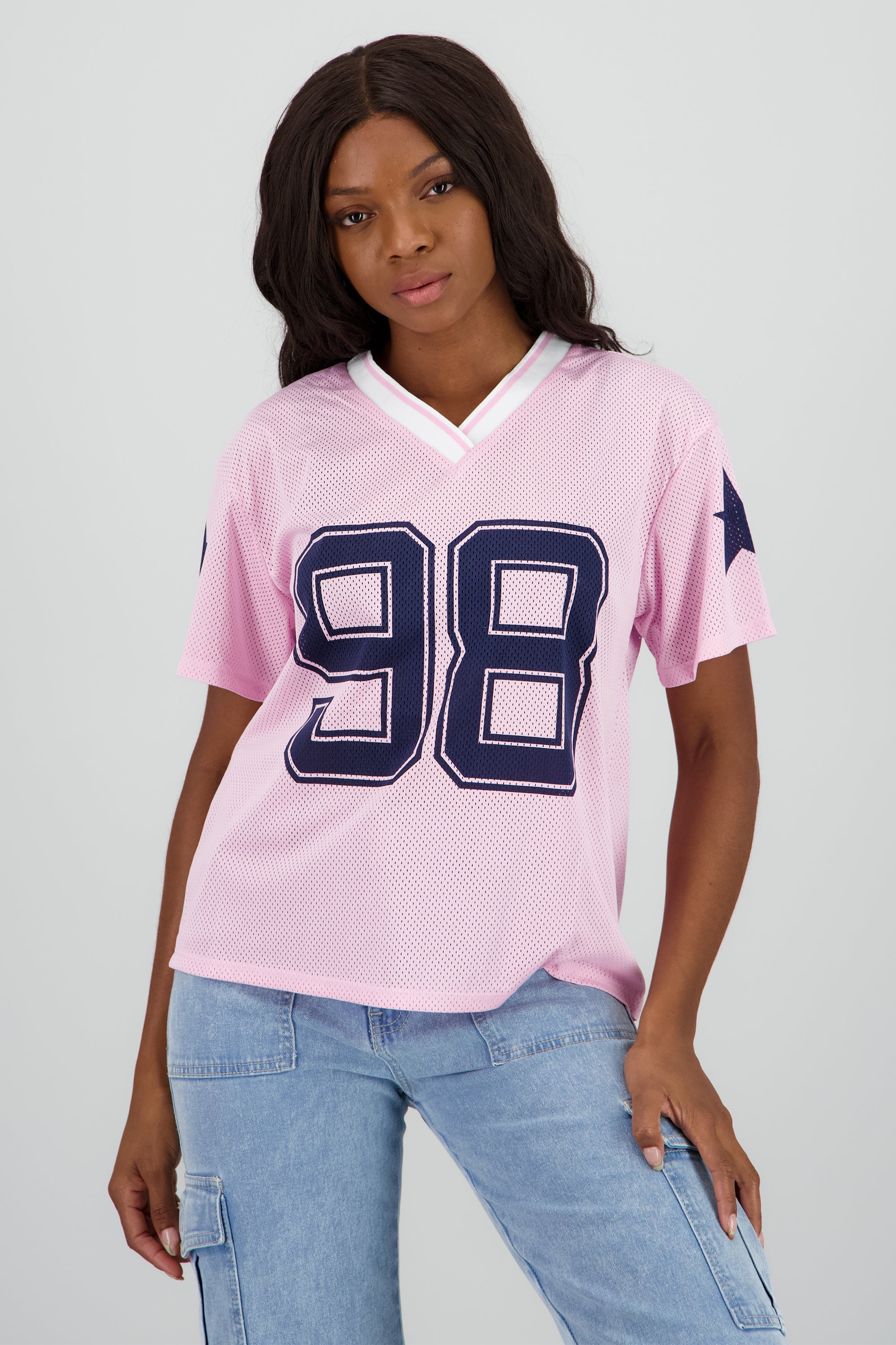 Playera over estampado numero ROSA COMBO