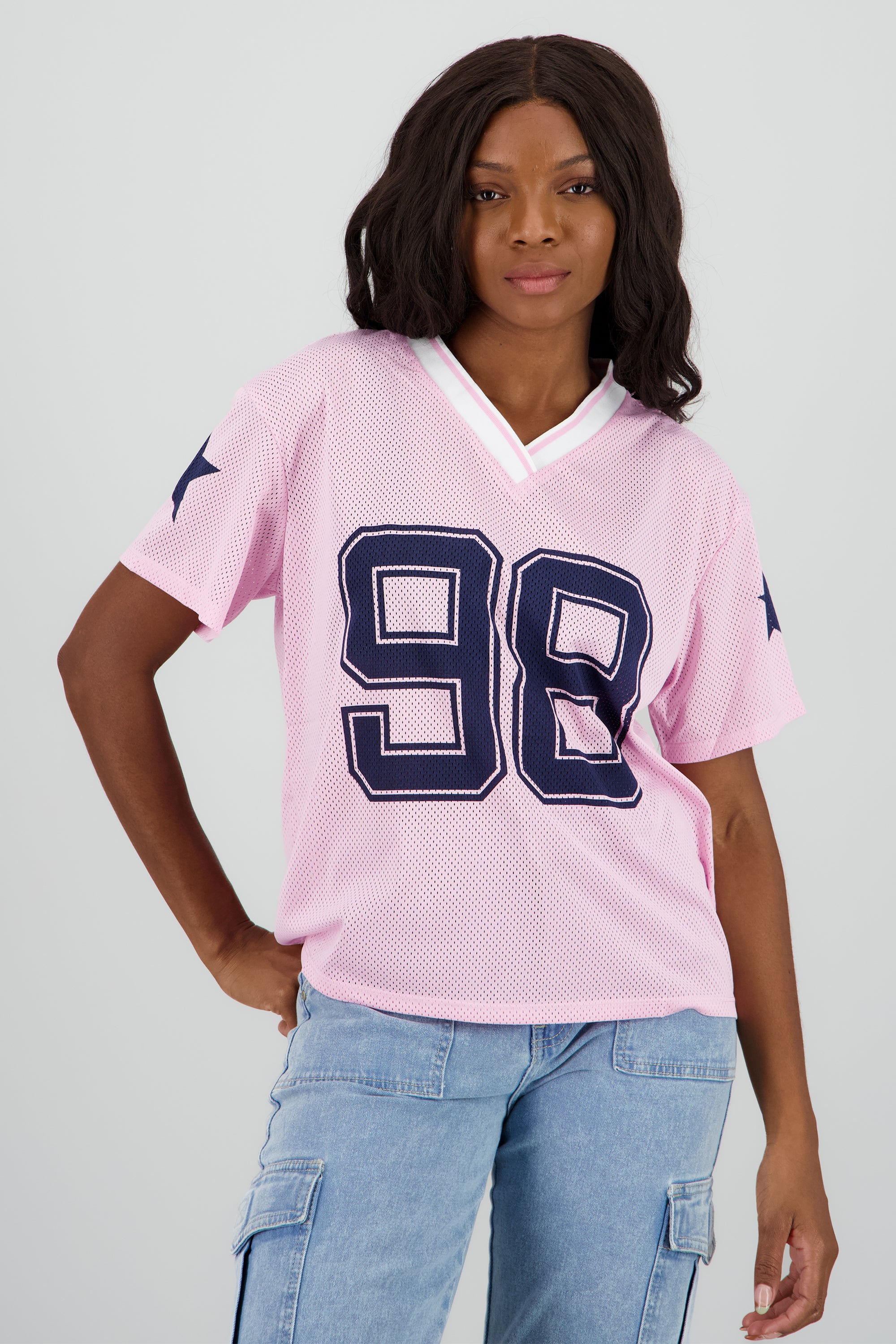Playera over estampado numero ROSA COMBO