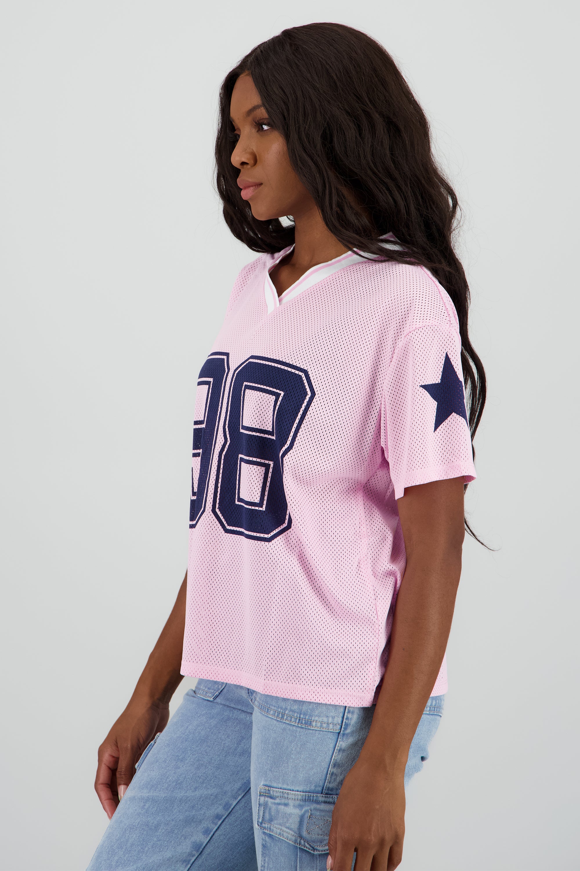 Playera over estampado numero ROSA COMBO