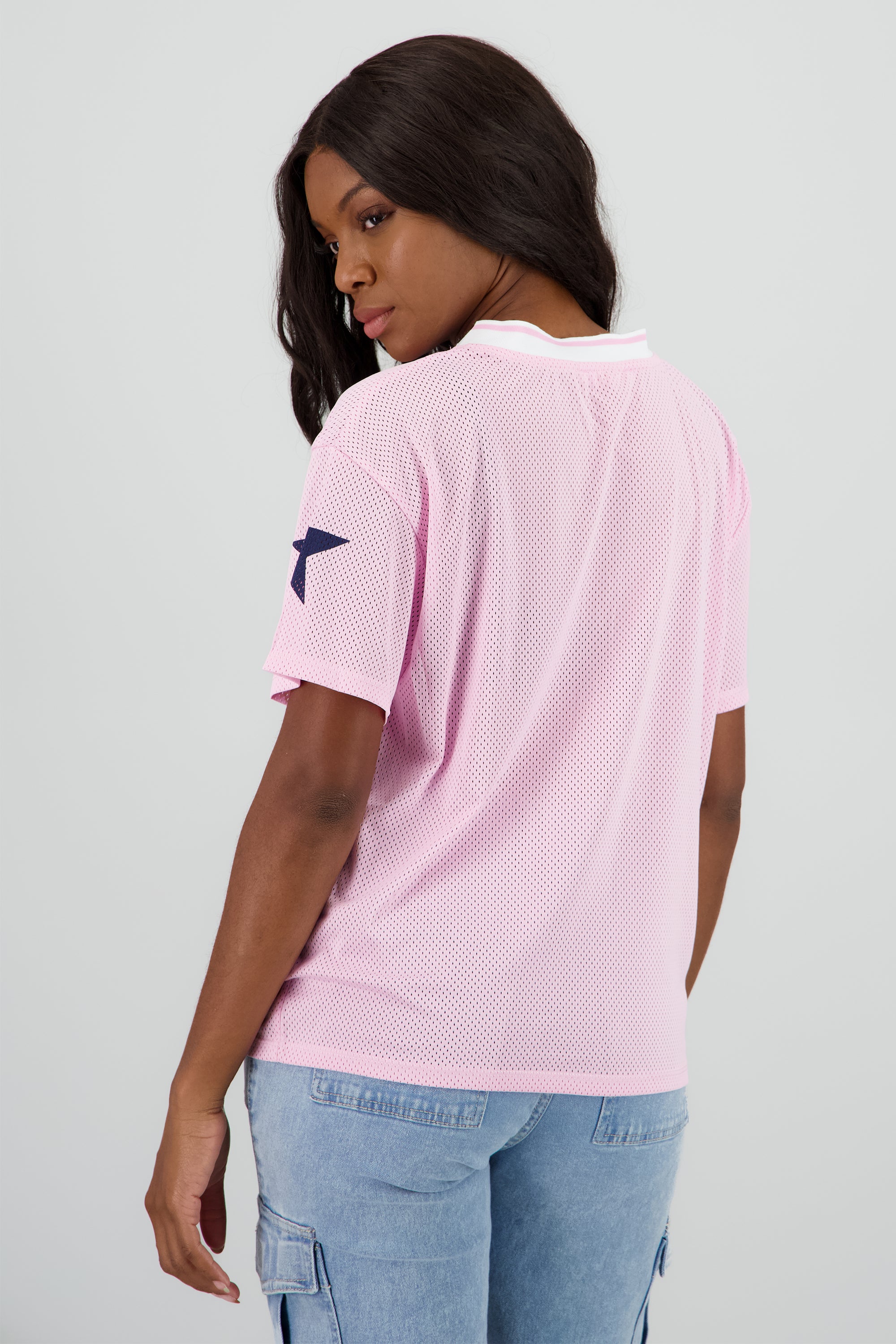 Playera over estampado numero ROSA COMBO