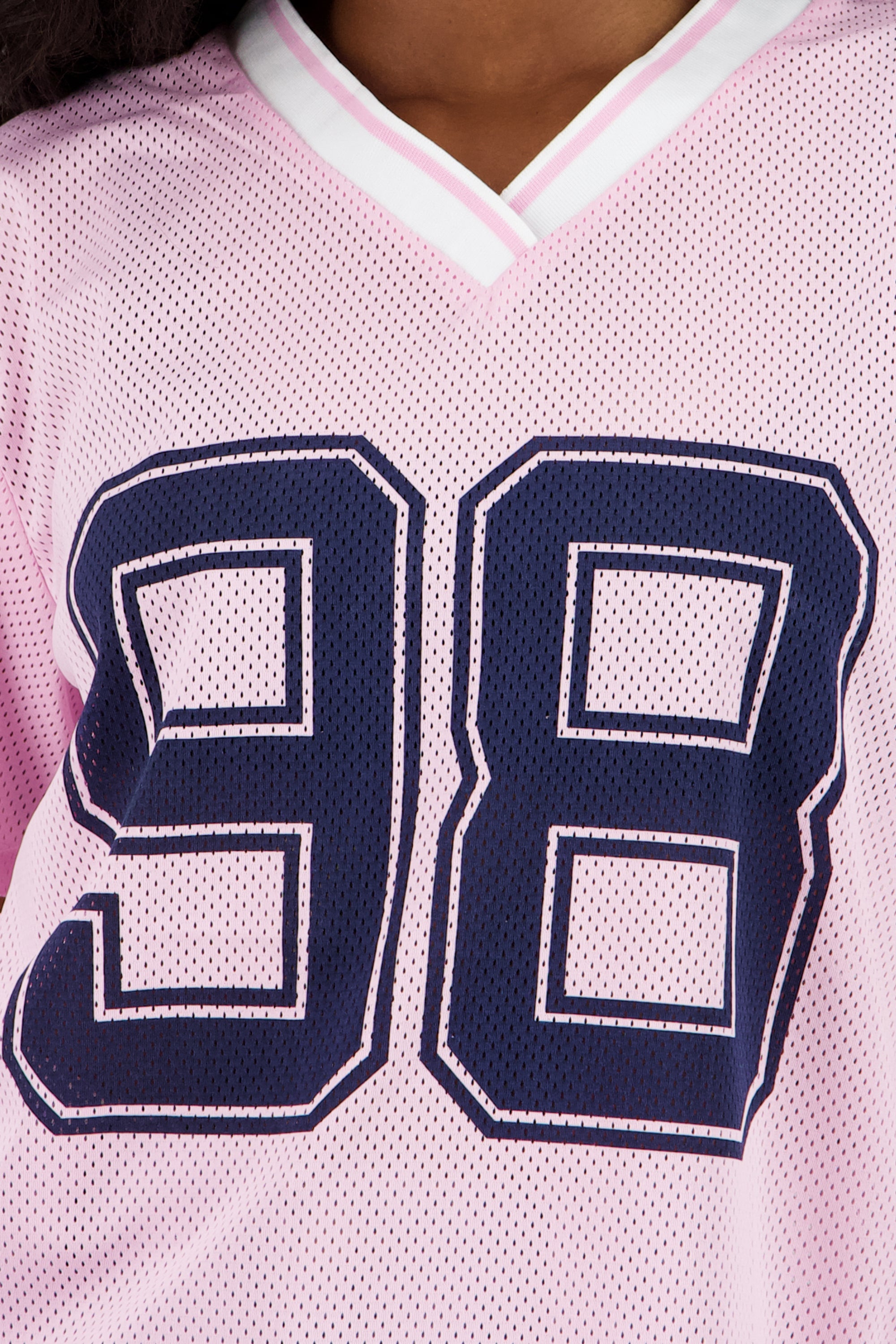 Playera over estampado numero ROSA COMBO