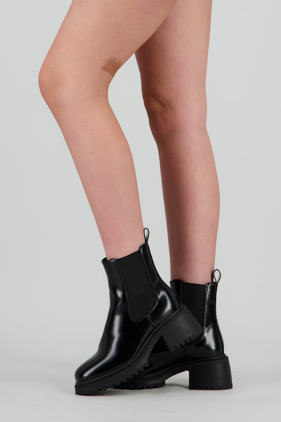 Botin chelsea punta rebanada tacon bloque