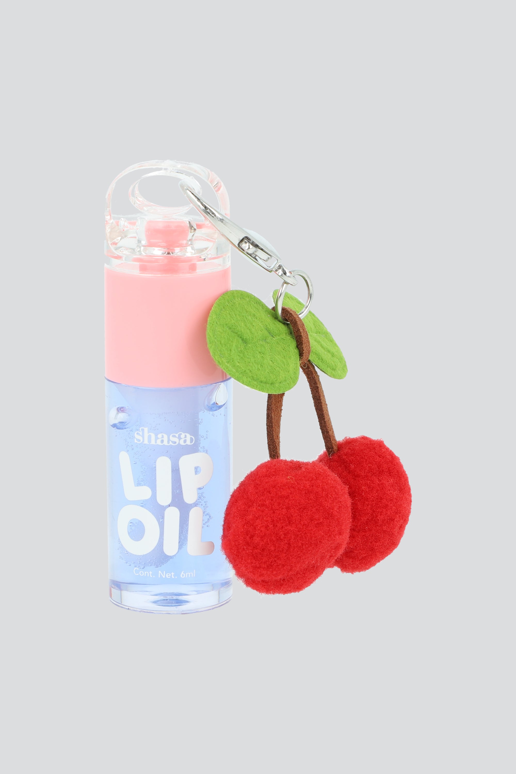 Lip oil charm cerezas pompon AZUL PASTEL