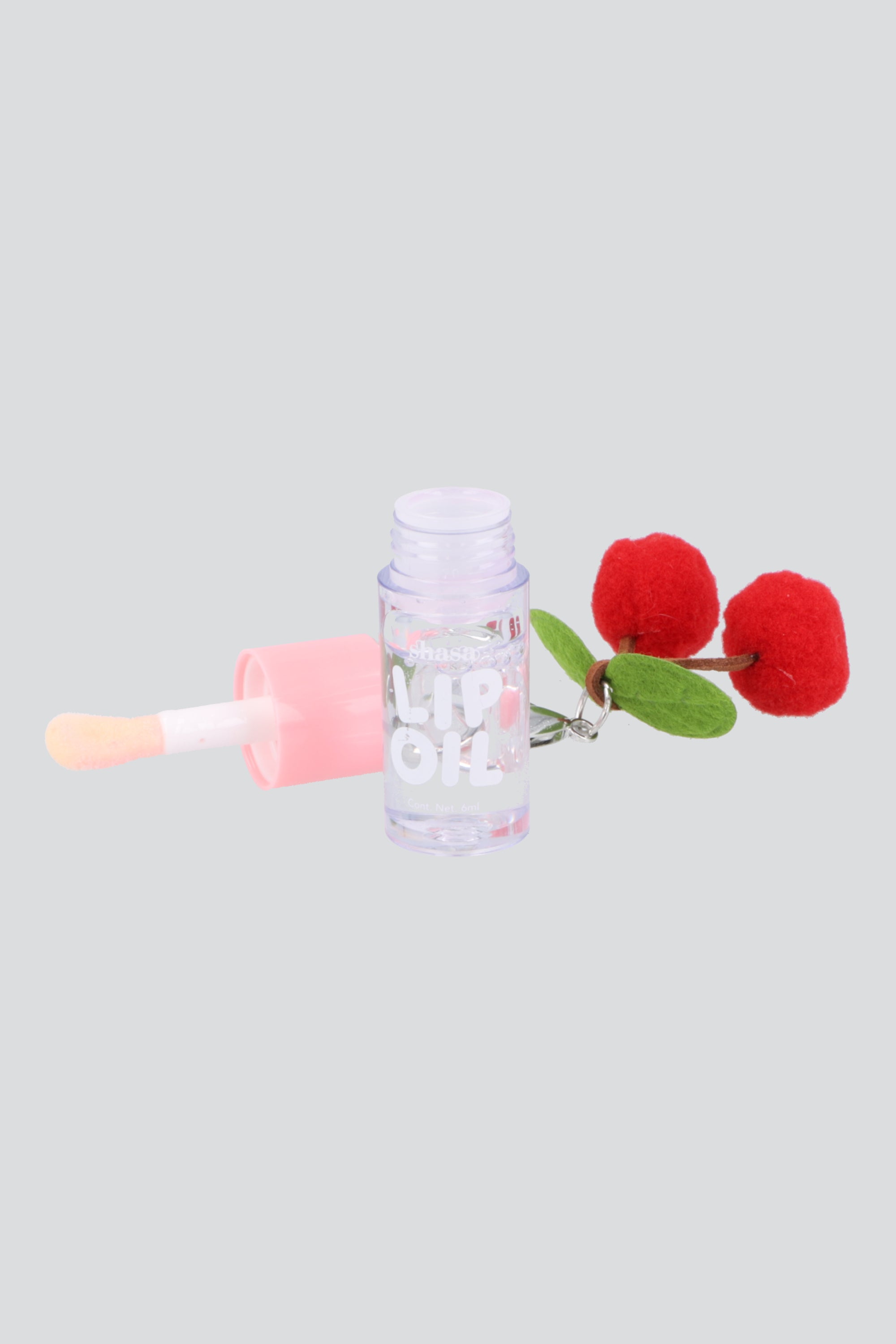 Lip oil charm cerezas pompon TRANSPARENTE